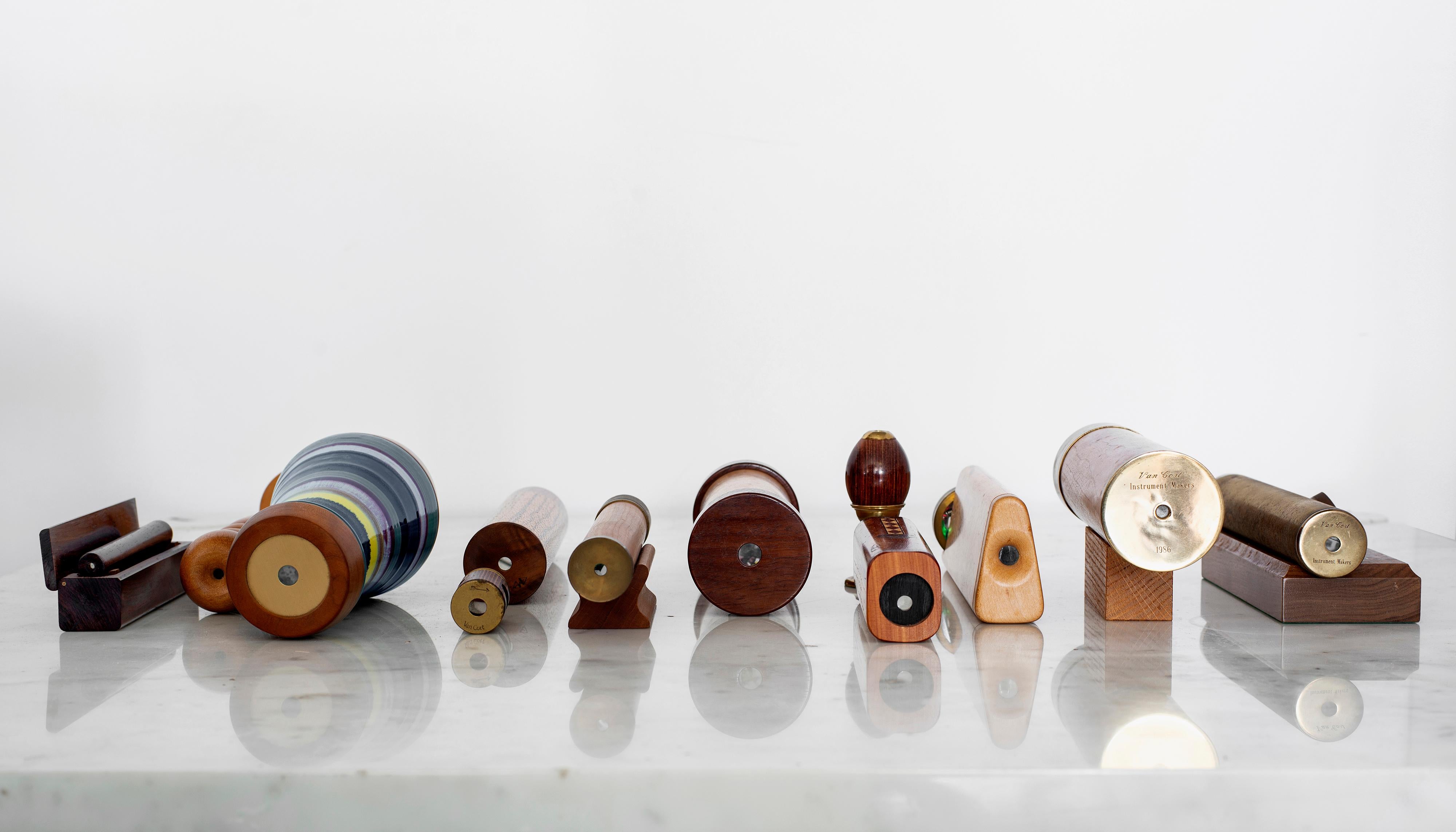 Unique collection of vintage kaleidoscopes made of different types of woods and materials. Each one is unique in size, shape and style, a true curiosity object for display.