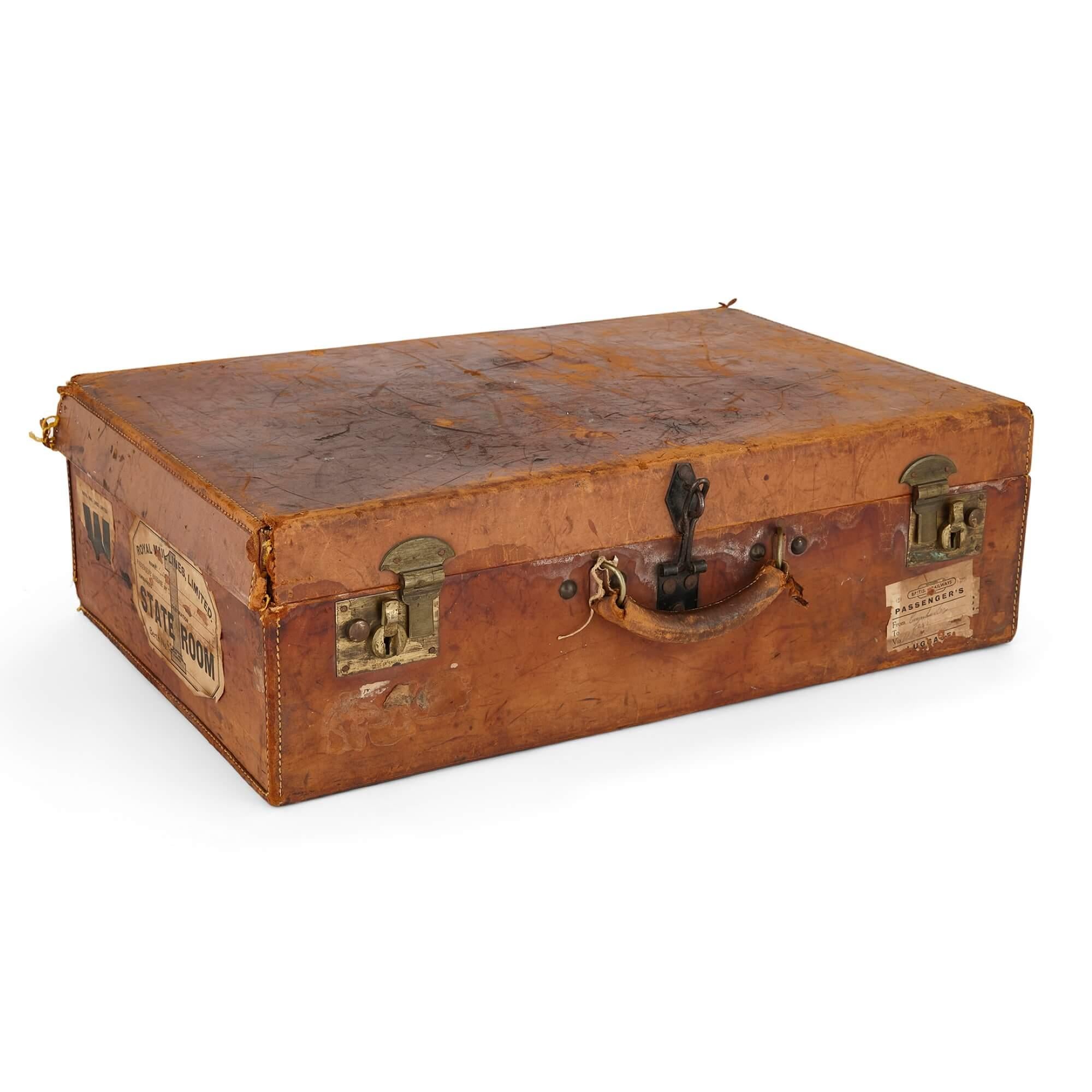 Collection of vintage luggage, a set of four English travel cases.
English, 20th Century
Green: height 18cm, width 67cm, depth 38cm.
Tan: height 18cm, width 53cm, depth 33cm.

Fascinating historical pieces, and fine objects that have stood the