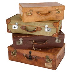 Collection of Vintage Luggage, a Set of Four English Travel Cases