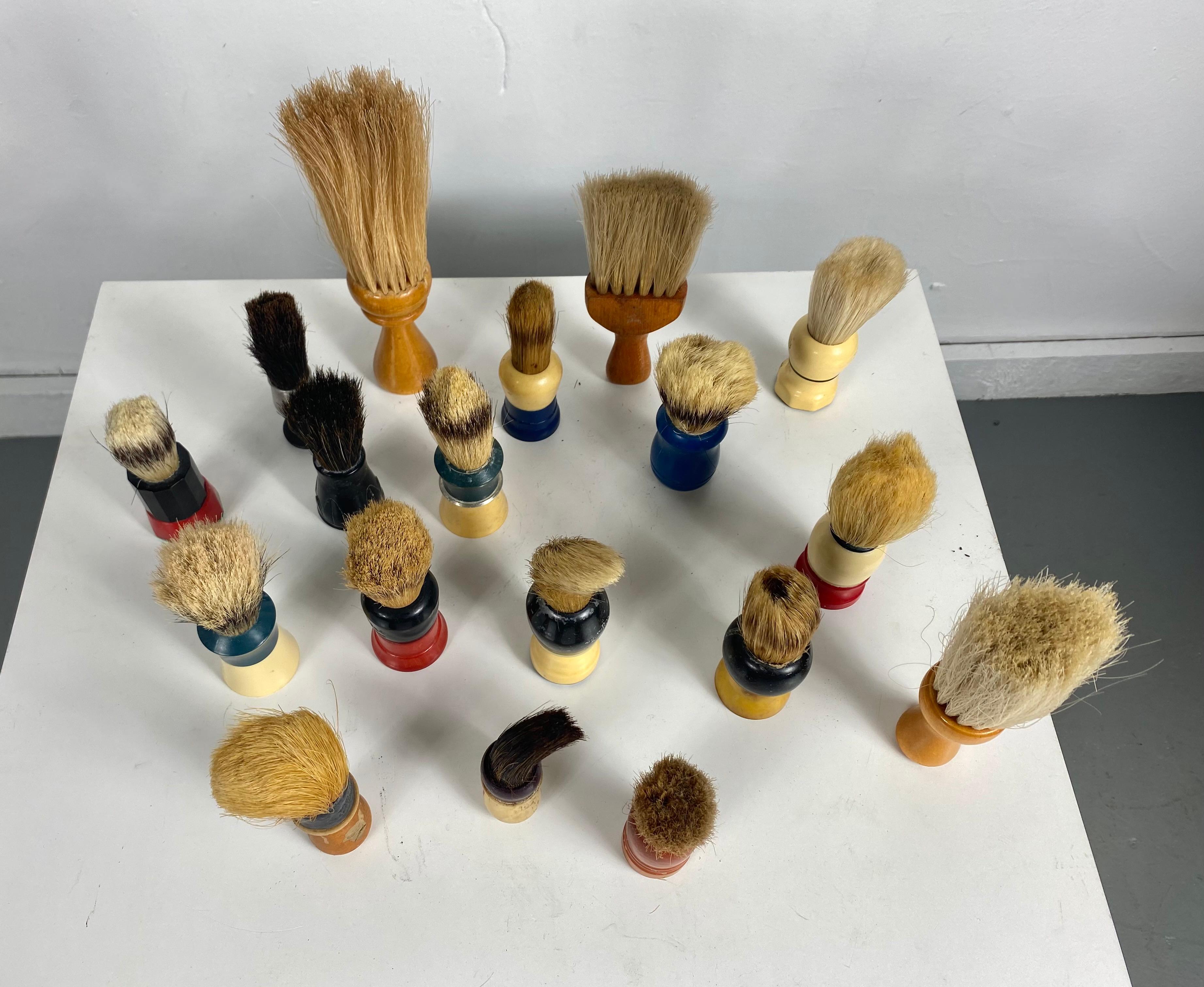 A collection of 17 distinctive vintage shaving brushes from the 1940s-1950s. Great design, colors, bakelite, carved plastic, wood. Horsehair, nylon, wonderful display or objects, several different manufactures.