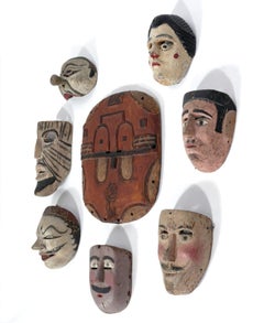 Collection of Worldwide Traveler's Hand Carved Folk Art Masks