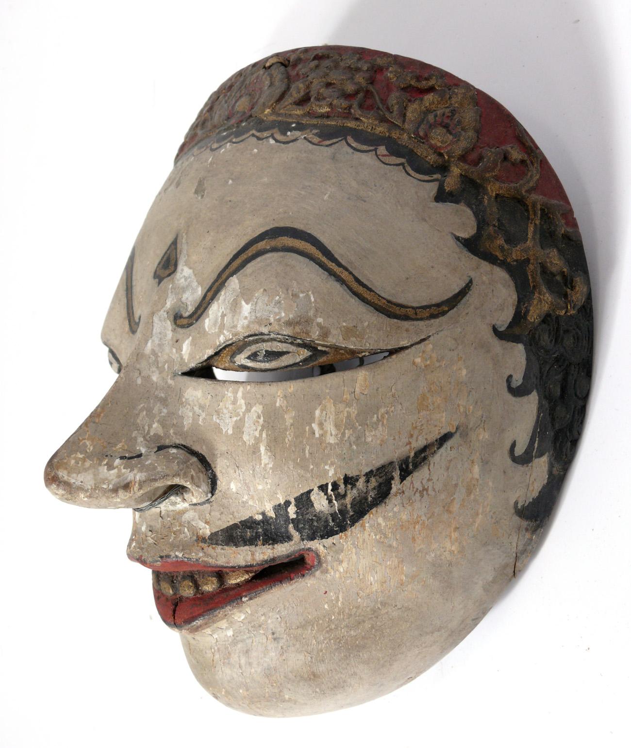 Balinese Collection of Worldwide Traveler's Hand Carved Folk Art Masks For Sale