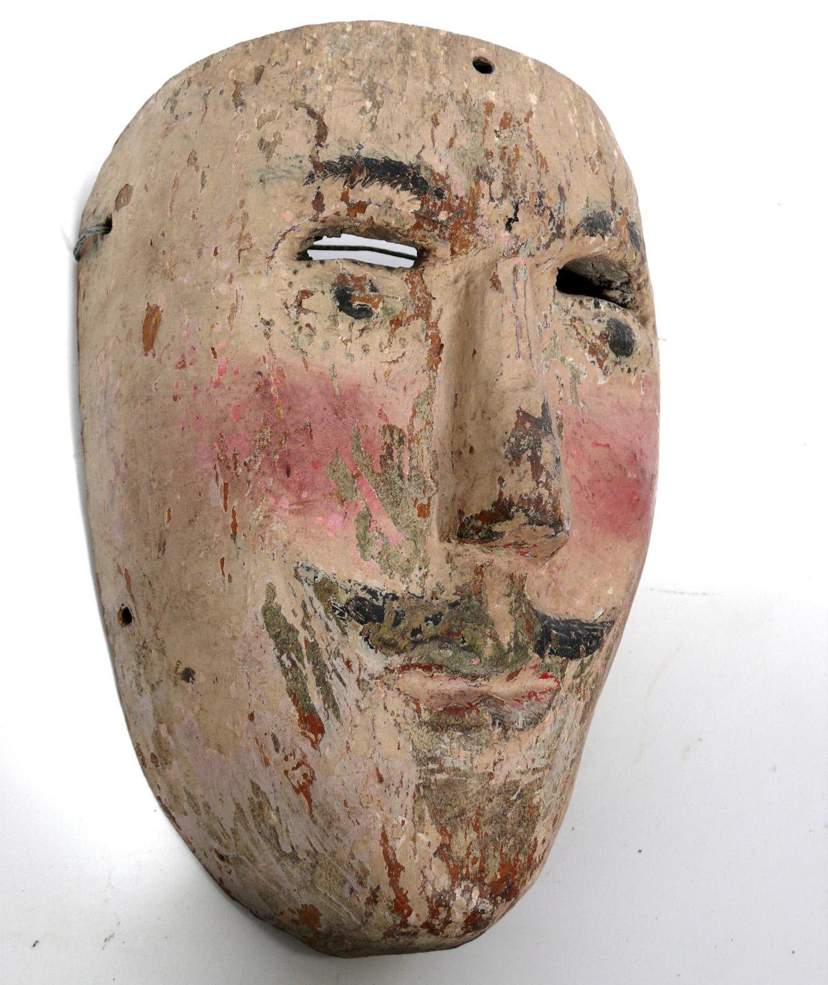 Collection of Worldwide Traveler's Hand Carved Folk Art Masks In Distressed Condition For Sale In Atlanta, GA