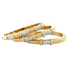 Collection of Yellow Gold and Diamond Bangle Bracelets