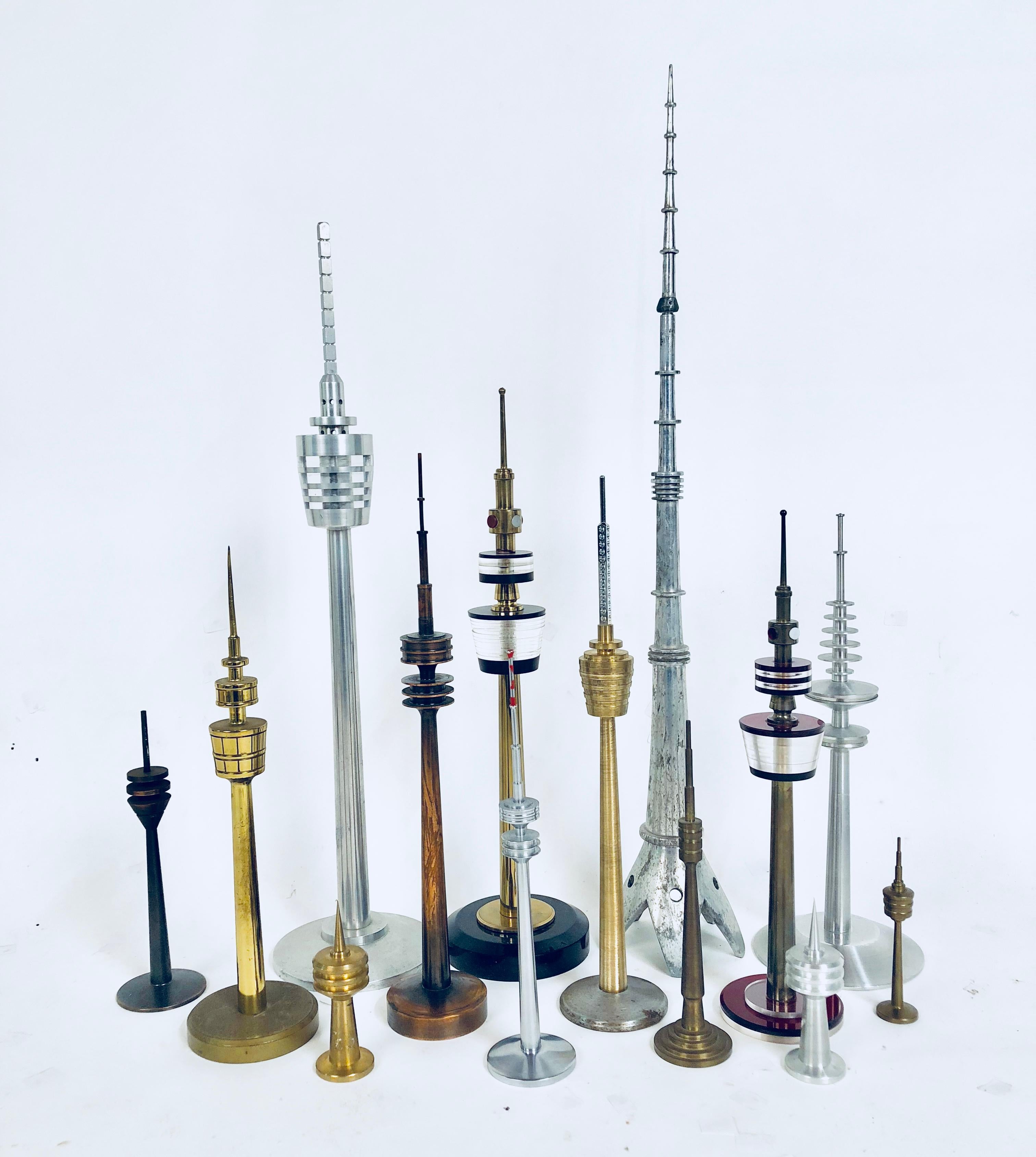 Rare and unusual collection of vintage Space Age looking TV tower models circa 1950-1970 from Europe. Made of steel, brass, spun aluminum and Lucite. Stunning conversational pieces. Great for above the mantel. Sizes range form 3.5 inches to 20.25