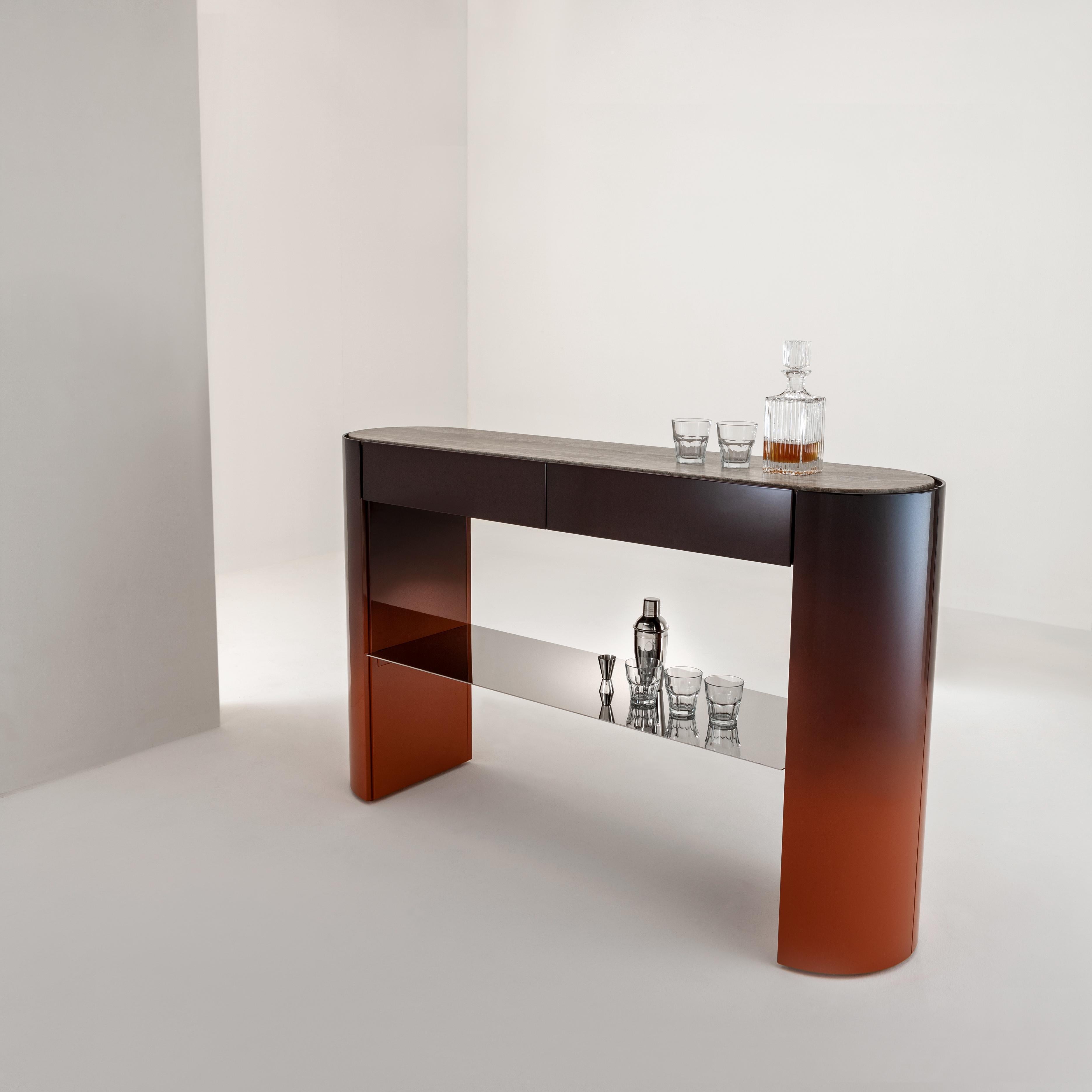 Collectionist Console Table by Laurameroni
Dimensions: W 160 x D 40 x H 96 cm
Materials: Glossy shaded lacquered wood RAL 8004, grey Travertine, polished steel.

Console with curved sides in glossy shaded lacquered wood, top in Grey Travertine and