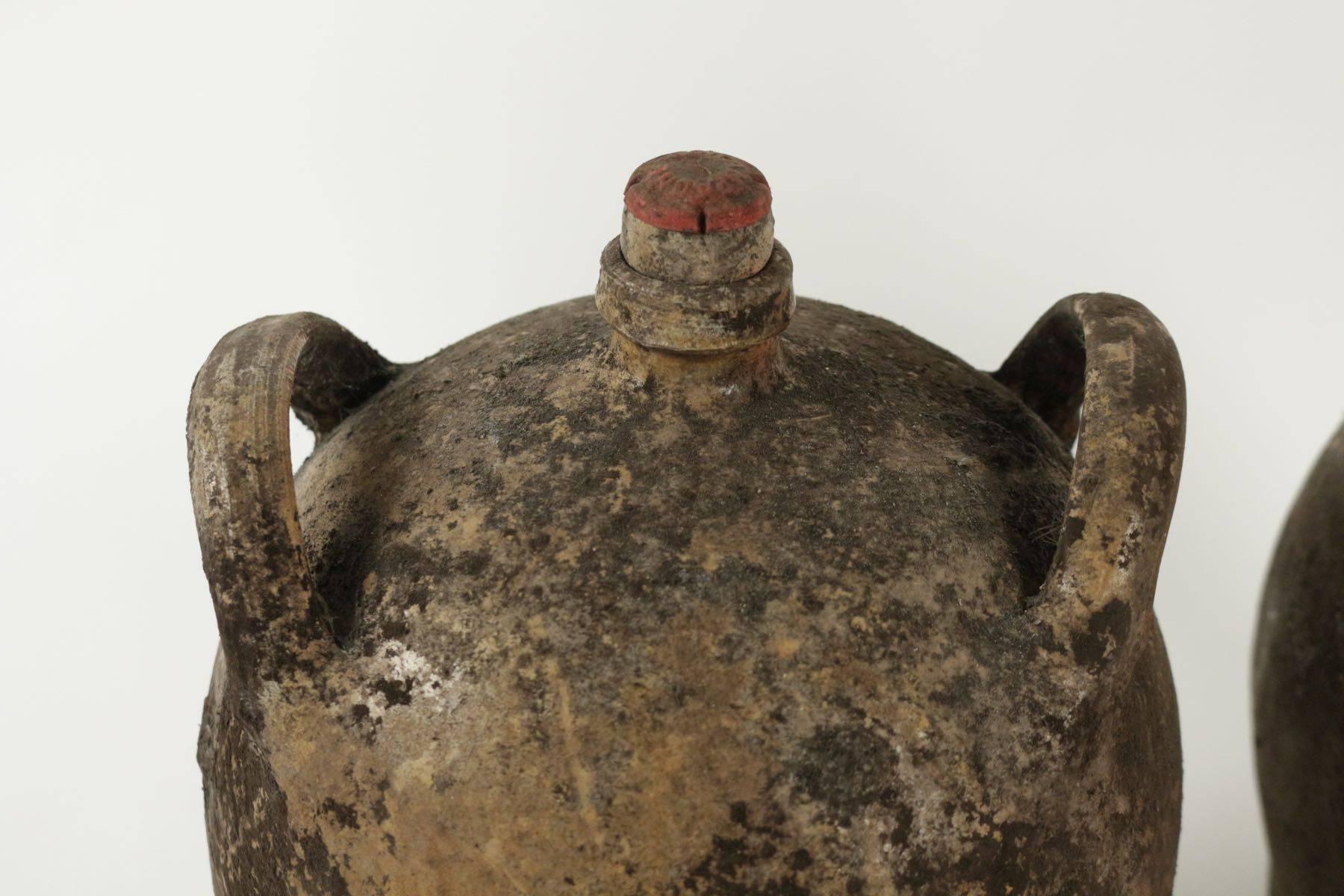 French Collections of Empty Old Bottles in Terracotta For Sale