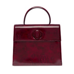 Collector Cartier «Happy Birthday» burgundy patent leather handbag