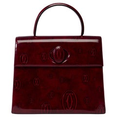 Collector Cartier «Happy Birthday» burgundy patent leather handbag