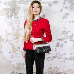 Collector CHANEL Boy Bag aus glattem Lammleder in Schwarz und Hellgold