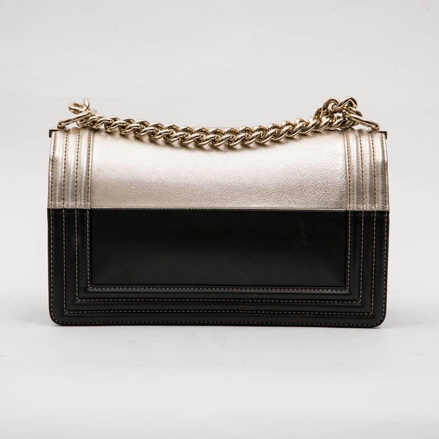 Collector CHANEL Boy Bag in Black and Pale Gold Smooth Lamb Leather In Excellent Condition In Paris, FR