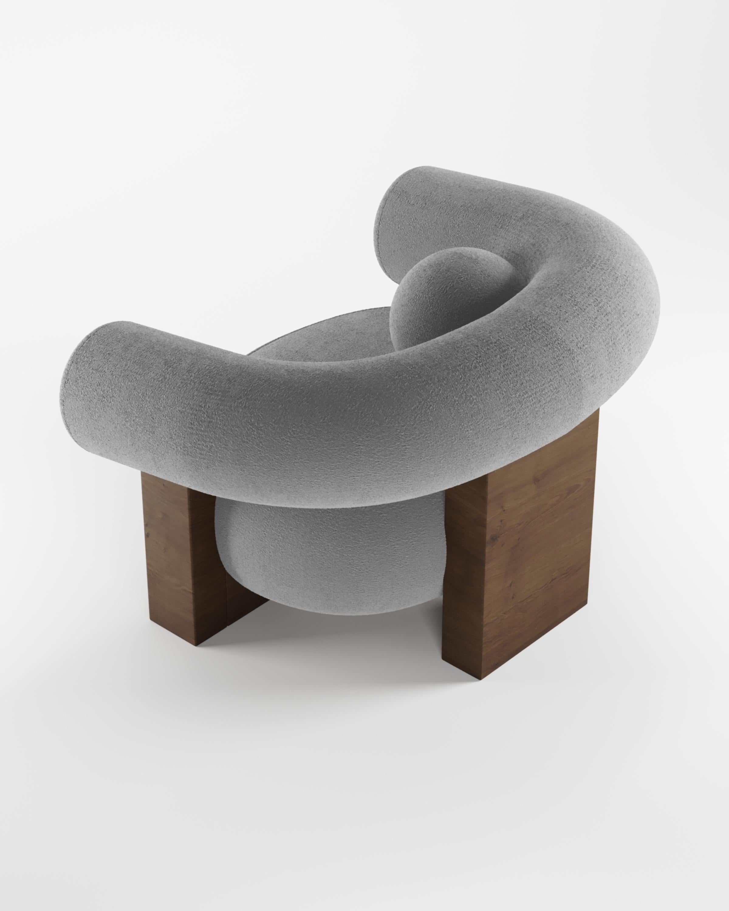 Cassete armchair was designed by Alter Ego for Collector.

Underpinned by a minimalist and sophistication aesthetic of clean lines.

DIMENSIONS
W 110 cm 43”
D 85 cm 33”
H 75 cm 29”

PRODUCT FEATURES
Structure in Smoked Oak wood. Upholstered in