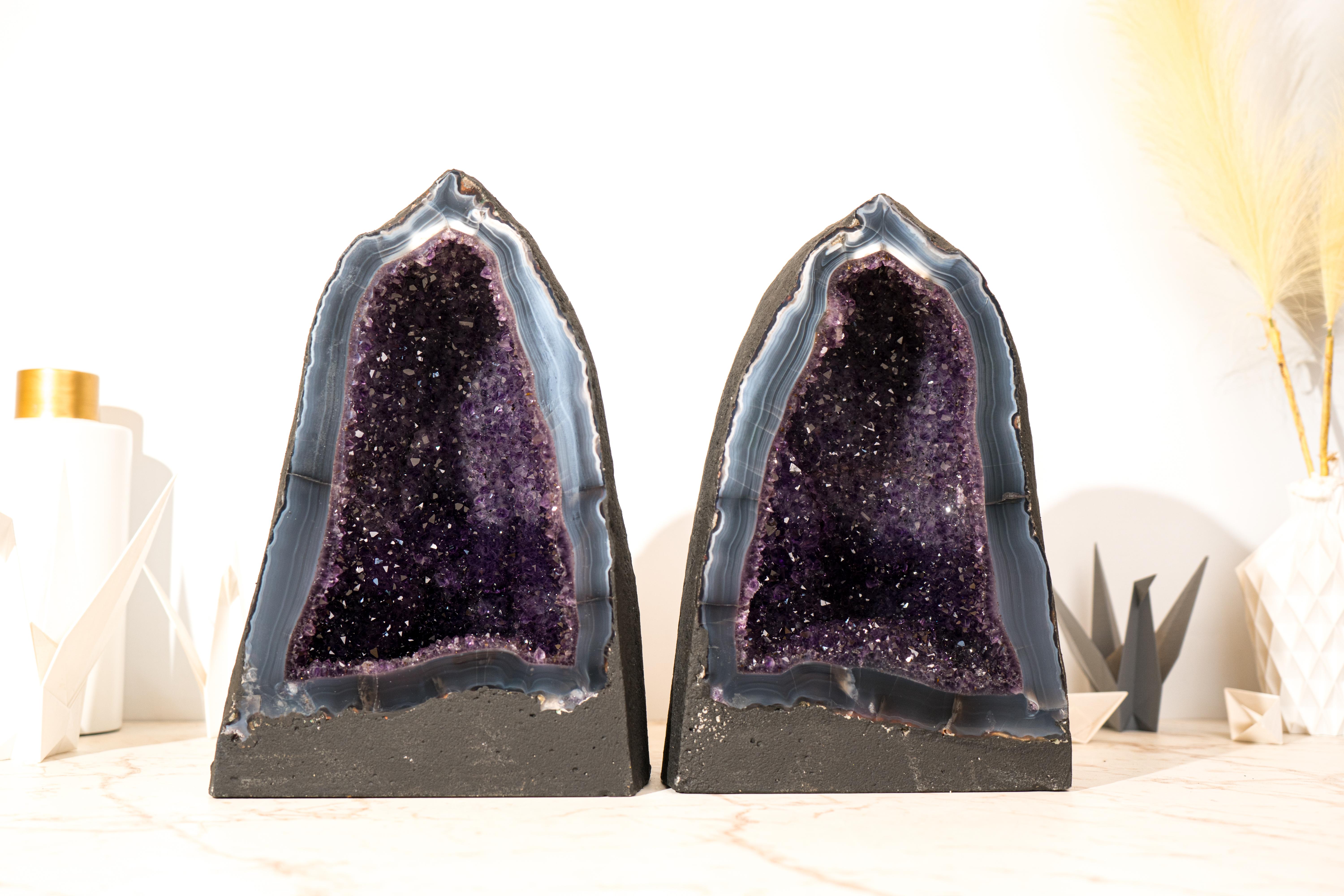 Gorgeous at first sight, these geodes, composed of Amethyst on Lace Agate matrices, showcase a rare and harmonious combination of colors, aesthetics, and pristine condition. Geodes of this caliber, particularly Brazilian geode cathedrals with such