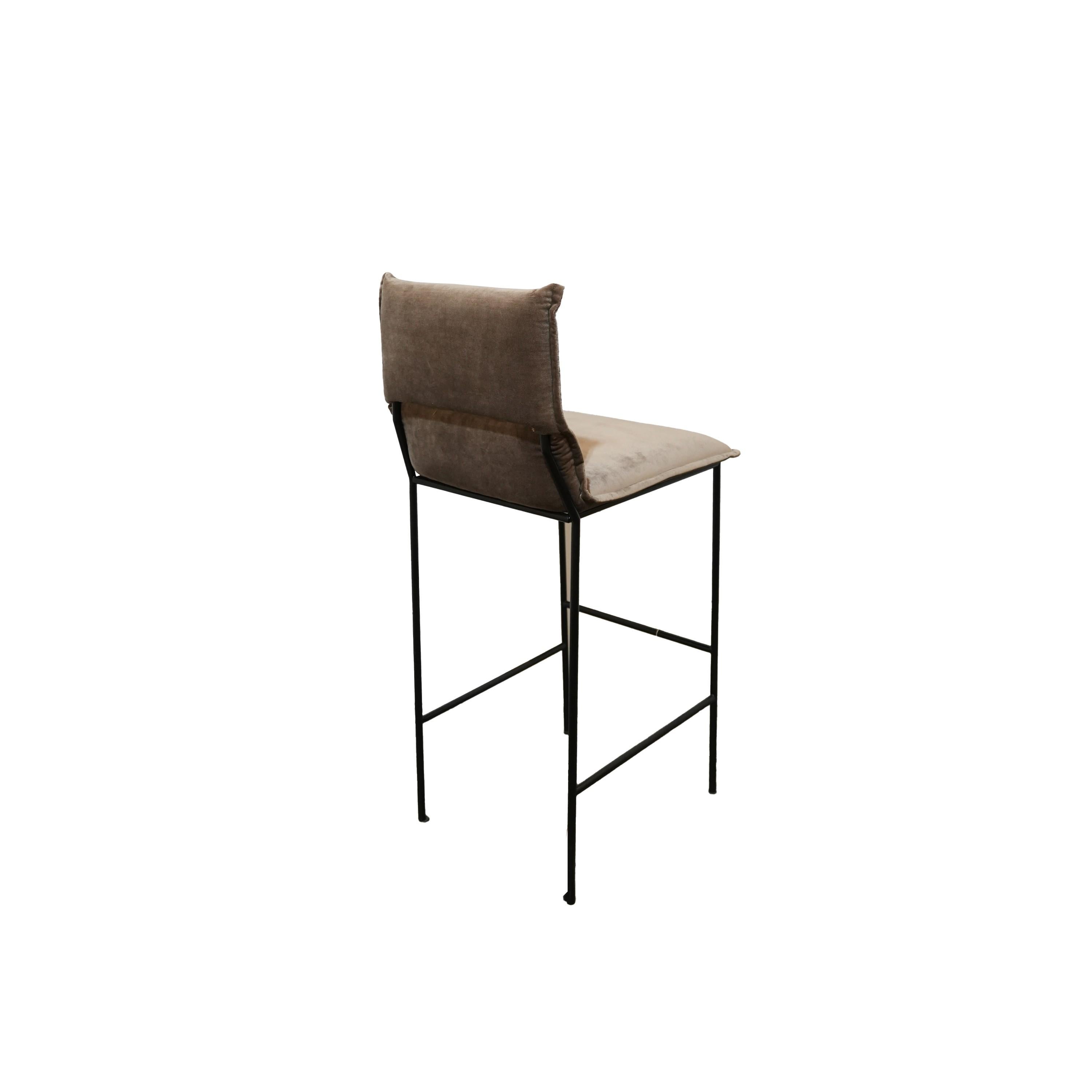 The Jeeves Bar chair by Collector series features sophisticated details and great versatility.
We have six of these available in a wonderfully soft yet durable fabric by JF Fabrics. 
Black metal frame finish. 