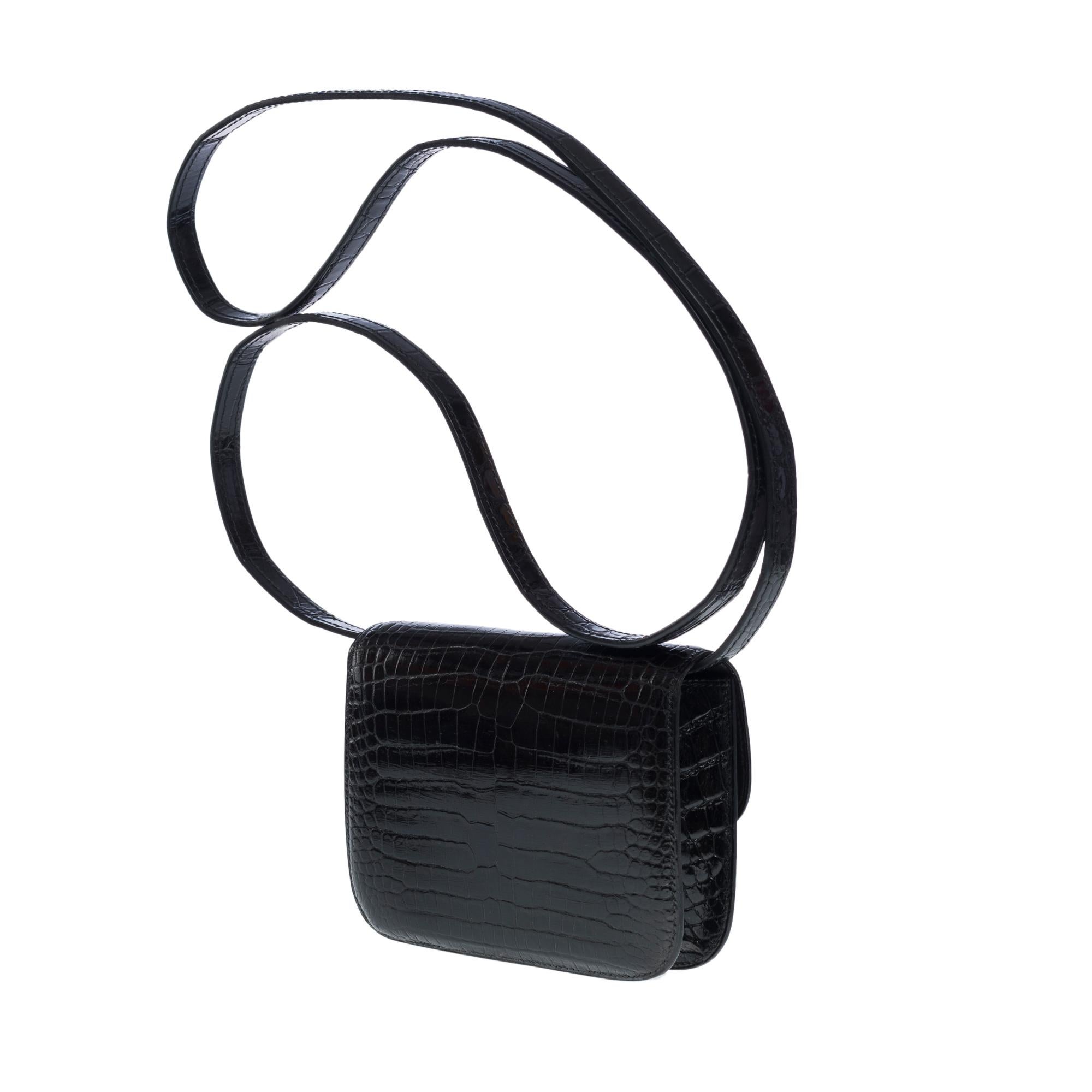Sammlerstücke Hermès Constance Micro Clutch mit Klappe aus schwarzem Porosus-Krokodil, GHW Damen