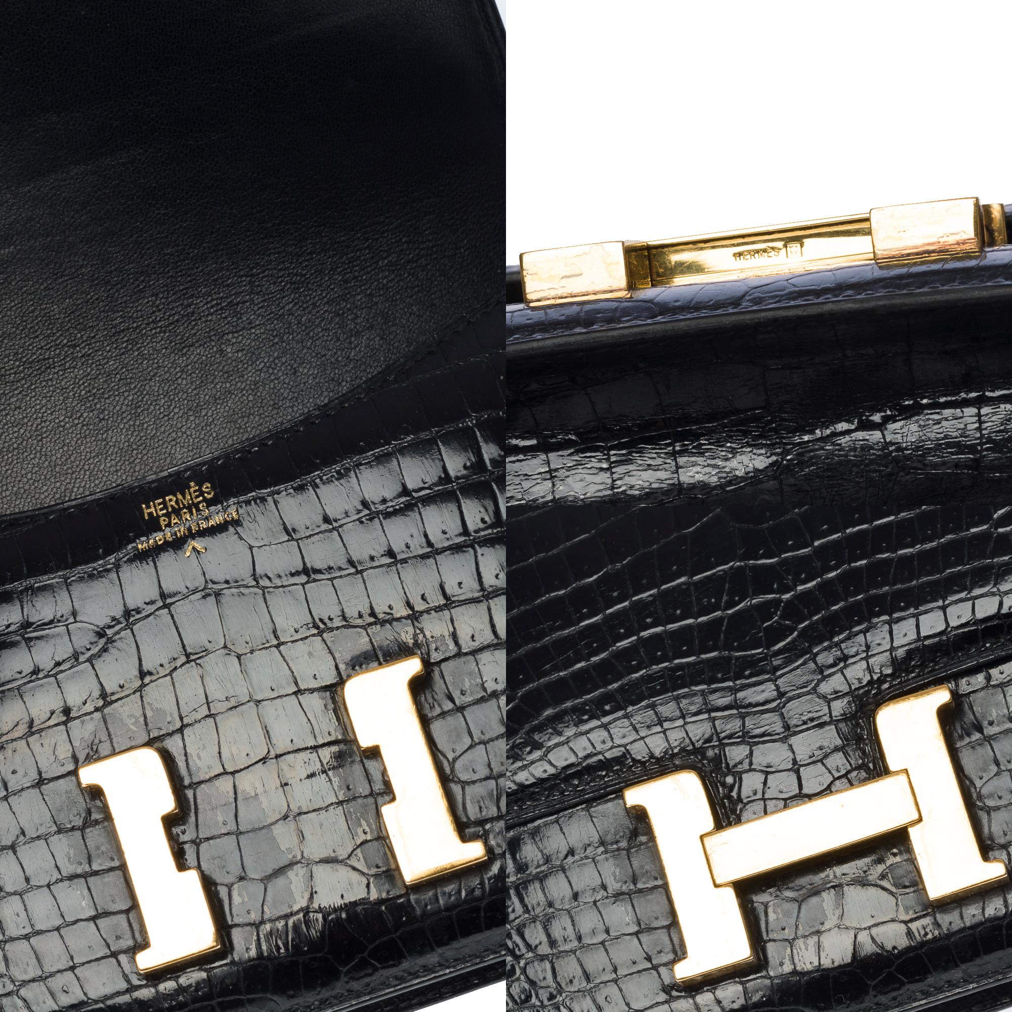 Sammlerstücke Hermès Constance Micro Clutch mit Klappe aus schwarzem Porosus-Krokodil, GHW 1