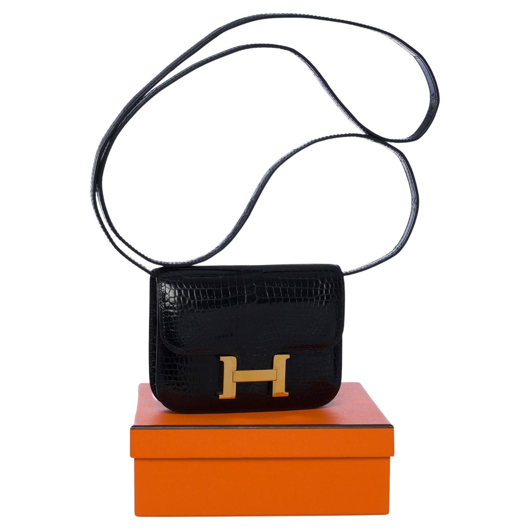 Collector Hermes Constance Micro Clutch flap bag in black Porosus Crocodile, GHW For Sale