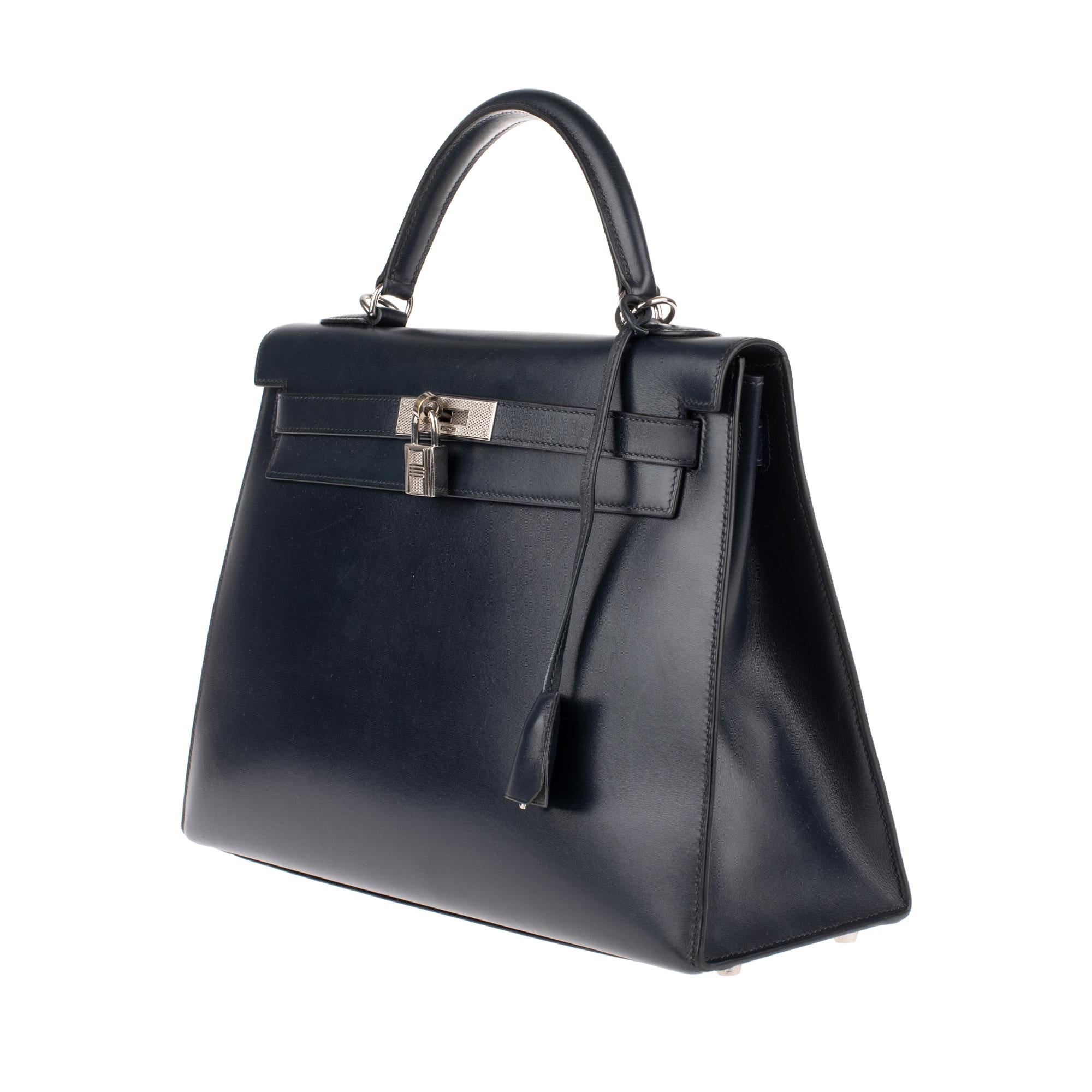 Stunning Gem and very rare collector piece very limited edition) : Hermes Kelly handbag 32 navy blue calfskin box leather , palladium silver metal trim, simple handle in navy leather, Shoulder strap in navy leather box for carrying hand or