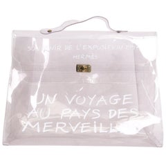 Collector HERMES Vintage Kelly Bag 'Au Pays des Merveilles' in Transparent  Vinyl For Sale at 1stDibs | un voyage au pays des merveilles bag hermes, un  voyage au pays des merveilles bag
