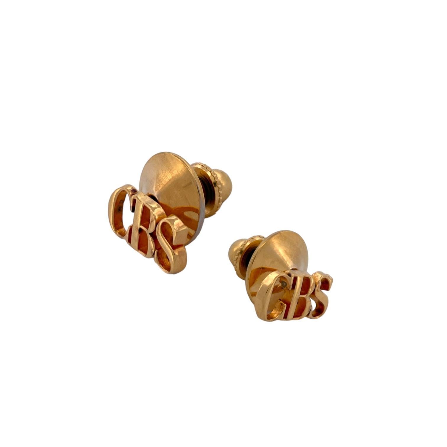 This extremely rare Tiffany and Co CBS  Network tie pin Set , a unisex accessory that embodies sophistication and style. Crafted from sleek silver and tastefully gold-plated, these cufflinks exude luxury. The distinctive 