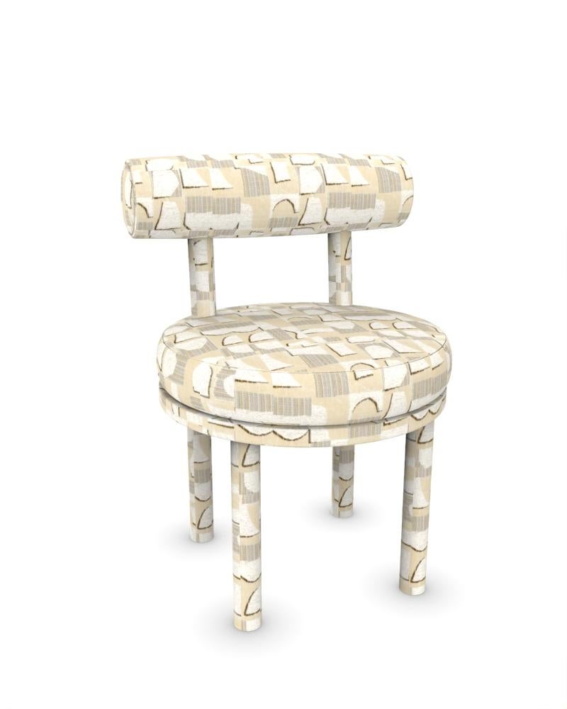 Sedia Moca moderna da collezione completamente rivestita in tessuto Hymne Beige- Casamance di Studio A

DIMENSIONI:
L 51 cm  20