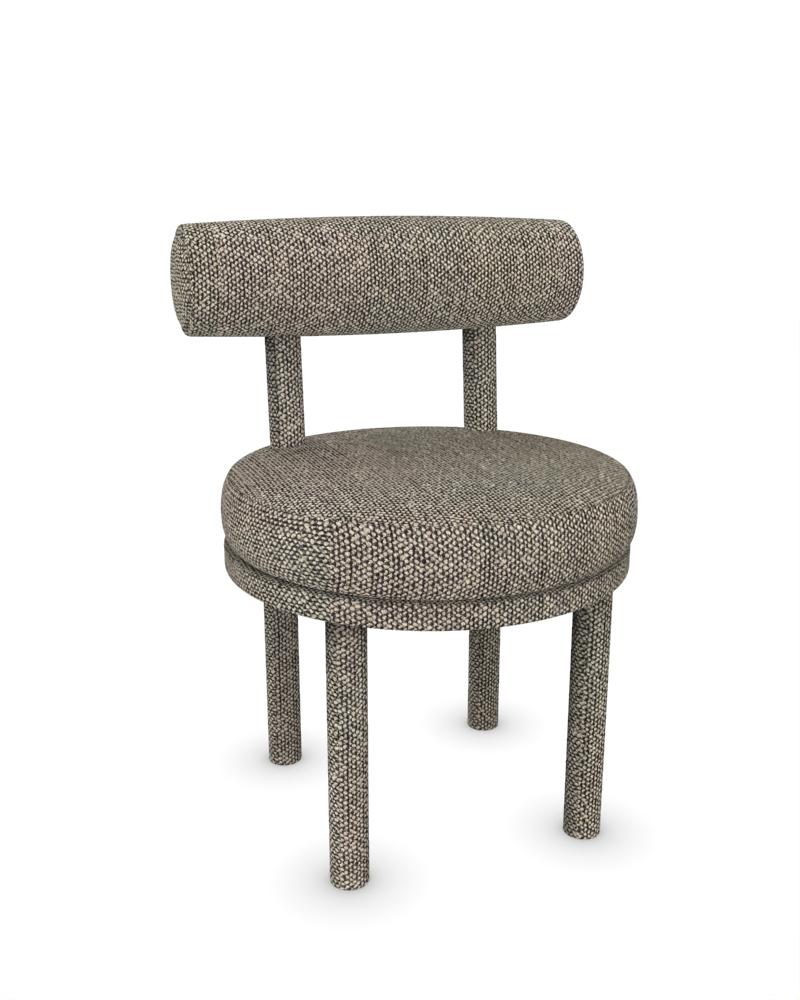 Collector Modern Moca Chair Fully Upholstered in Safire 0003 Fabric by Studio Rig

DIMENSIONS:
W 51 cm  20”
D 53 cm  21”
H 86 cm  34”
SH 49cm  19”



A chair that mixes both modern and classical design approaches.
Designed to hug the body, durable