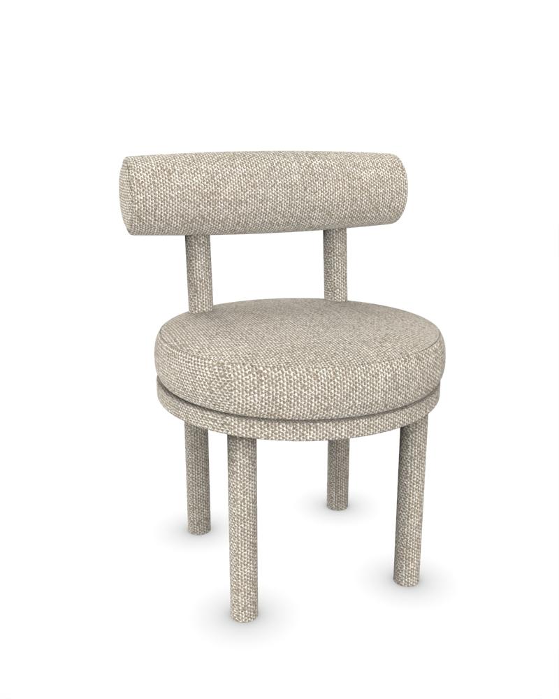 Collector Modern Moca Chair Fully Upholstered in Safire 0004 Fabric by Studio Rig

DIMENSIONS:
W 51 cm  20”
D 53 cm  21”
H 86 cm  34”
SH 49cm  19”



A chair that mixes both modern and classical design approaches.
Designed to hug the body, durable