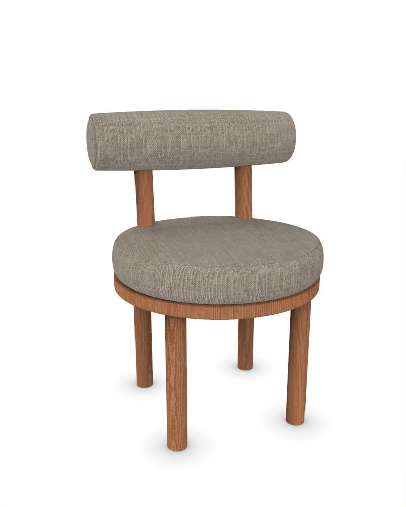 Collector Modern Moca Chair Upholstered in Famiglia 08 Fabric and Smoked Oak by Studio Rig

DIMENSIONS:
W 51 cm  20”
D 53 cm  21”
H 86 cm  34”
SH 49cm  19”



A chair that mixes both modern and classical design approaches.
Designed to hug the body,