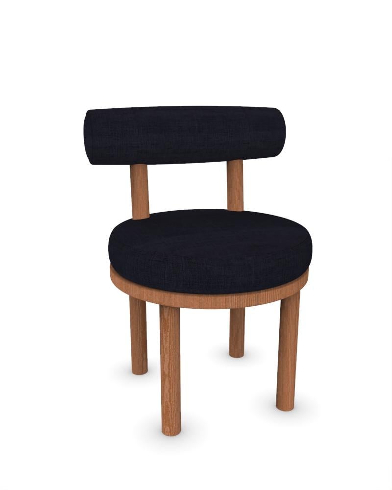 Collector Modern Moca Chair Upholstered in Famiglia 45 Fabric and Smoked Oak by Studio Rig

DIMENSIONS:
W 51 cm  20”
D 53 cm  21”
H 86 cm  34”
SH 49cm  19”



A chair that mixes both modern and classical design approaches.
Designed to hug the body,