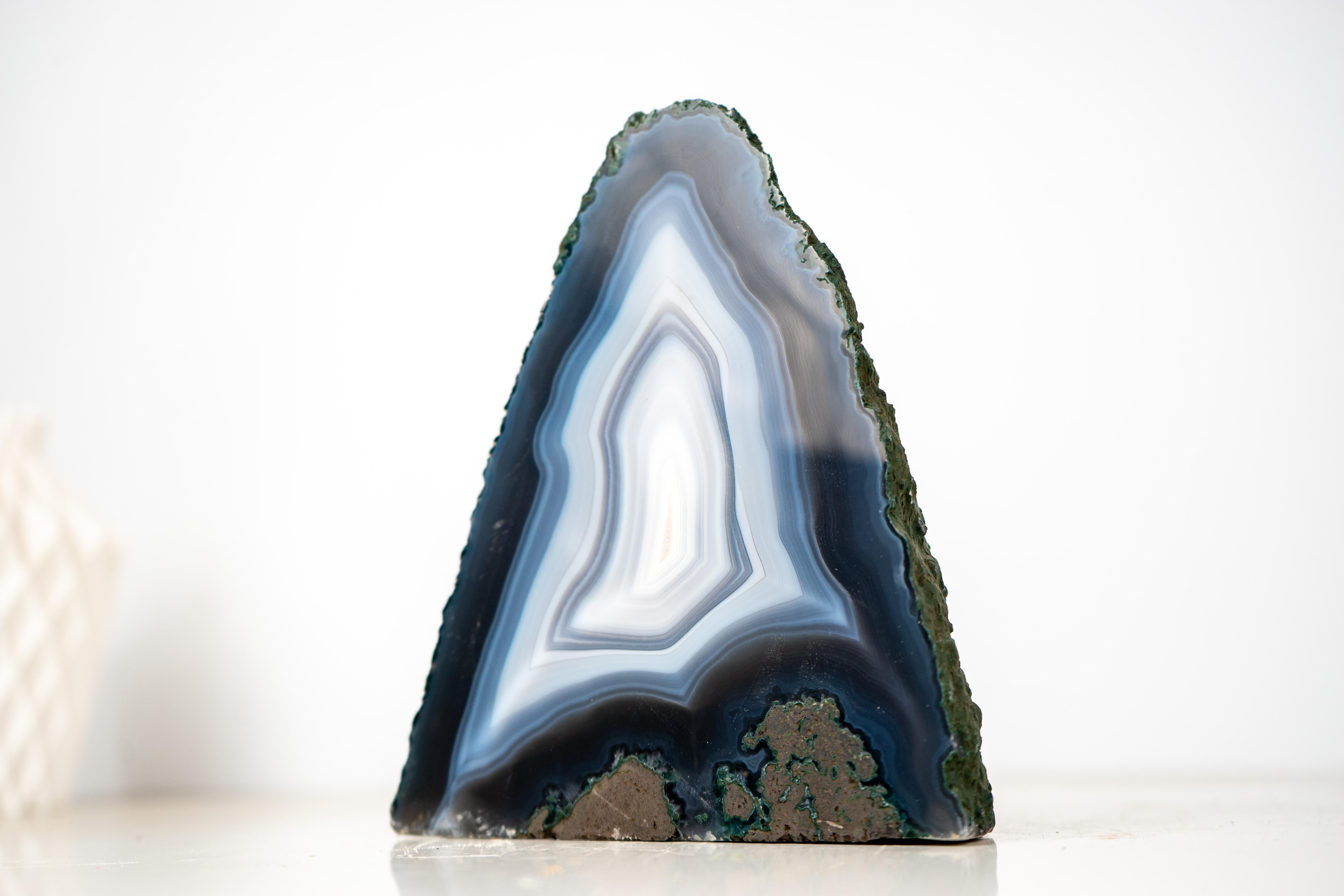 Collector’s Blue & White Lace Agate Geode with Rare Concentric Layers of Bold Laces

▫️ Description

An artwork painted by nature over millions of years, this rare Agate Geode showcases delicate laces of agate that formed concentric bands,