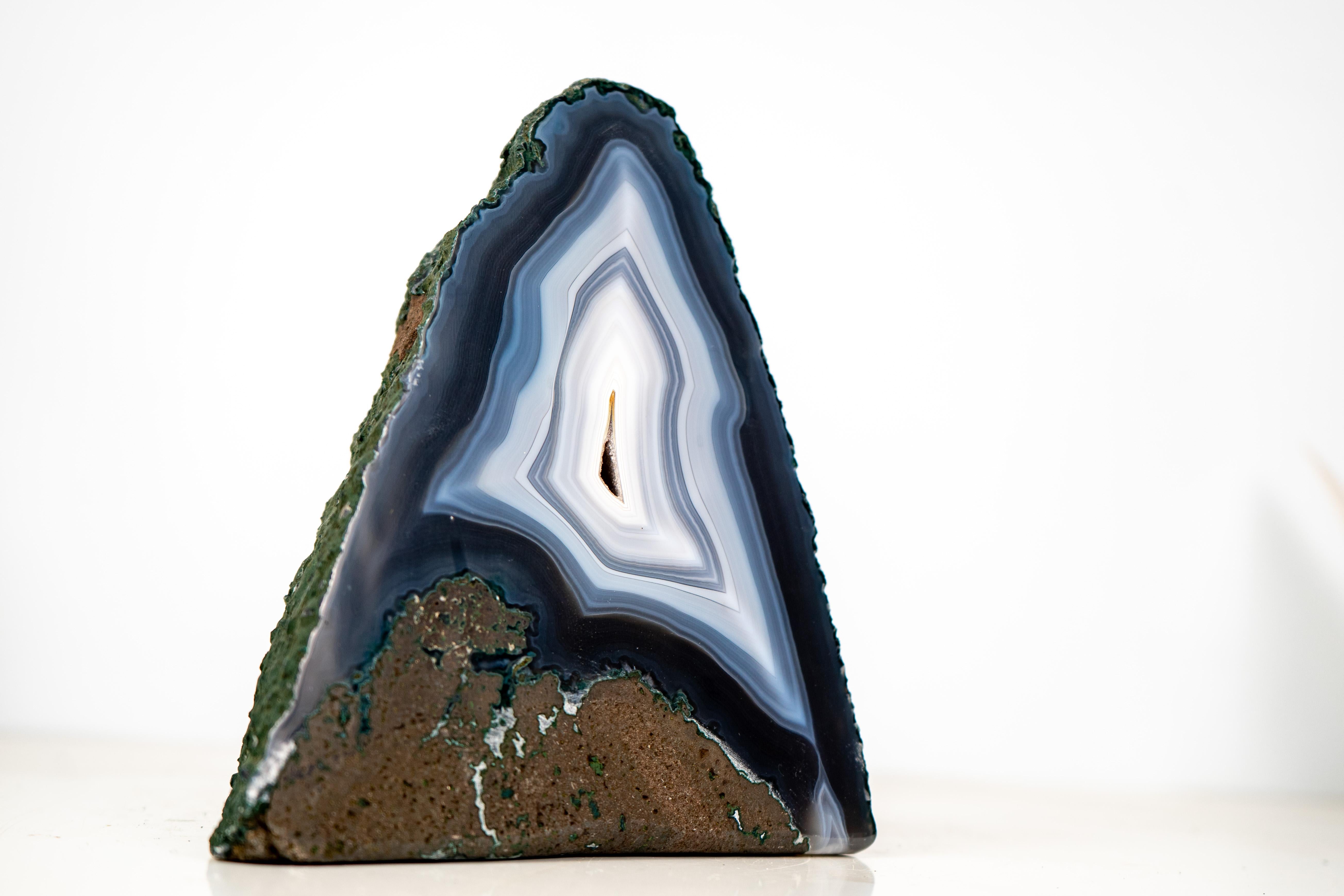 Collector’s Blue & White Lace Agate Geode with Rare Concentric Layers of Bold Laces

▫️ Description

An artwork painted by nature over millions of years, this rare Agate Geode showcases delicate laces of agate that formed concentric bands,