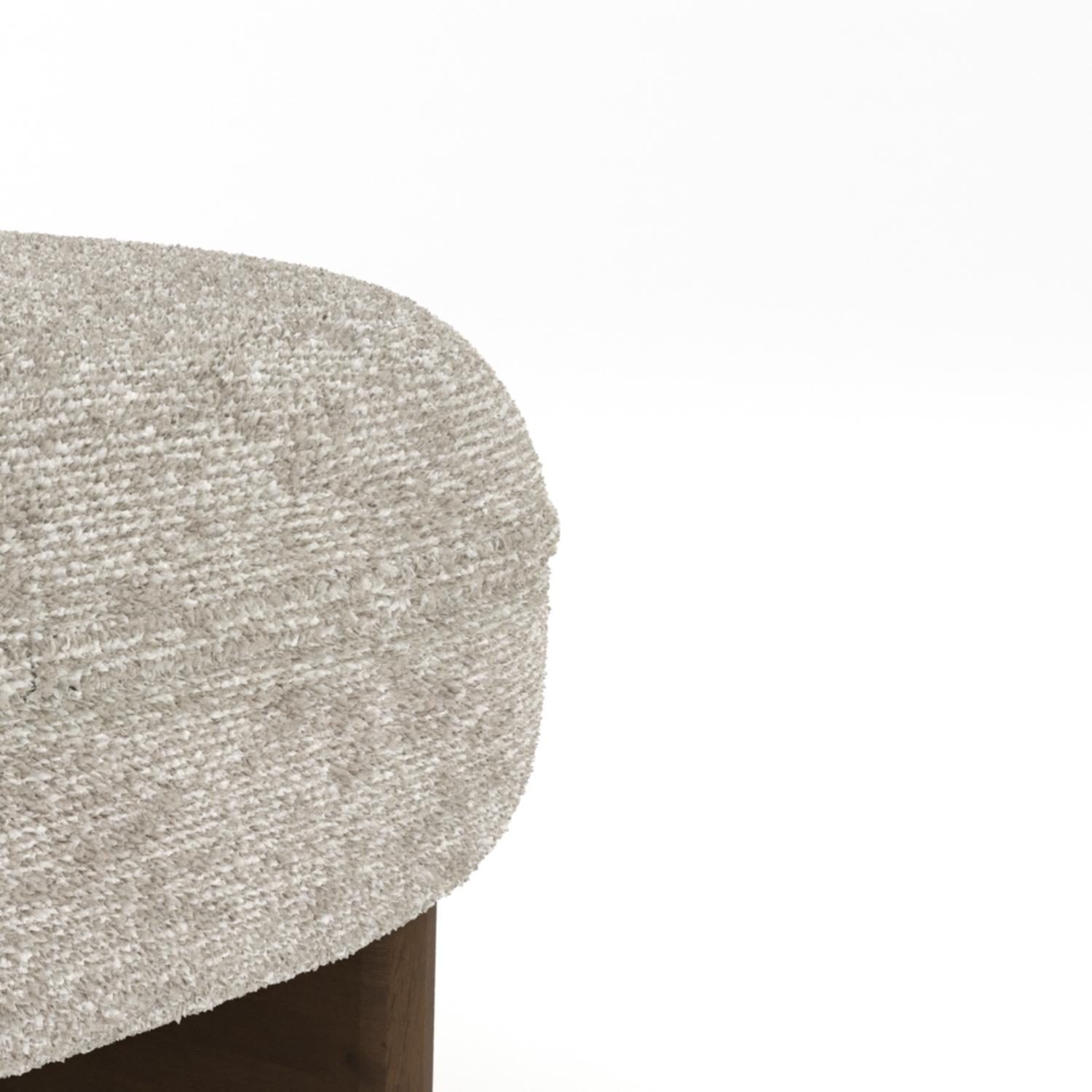 A harmonious blend of craftsmanship and relaxation, the Riva Lounge Chair features a sculptural wooden base paired with plush, upholstered cushions. Its fluid, organic form offers both visual appeal and exceptional comfort, making it a perfect
