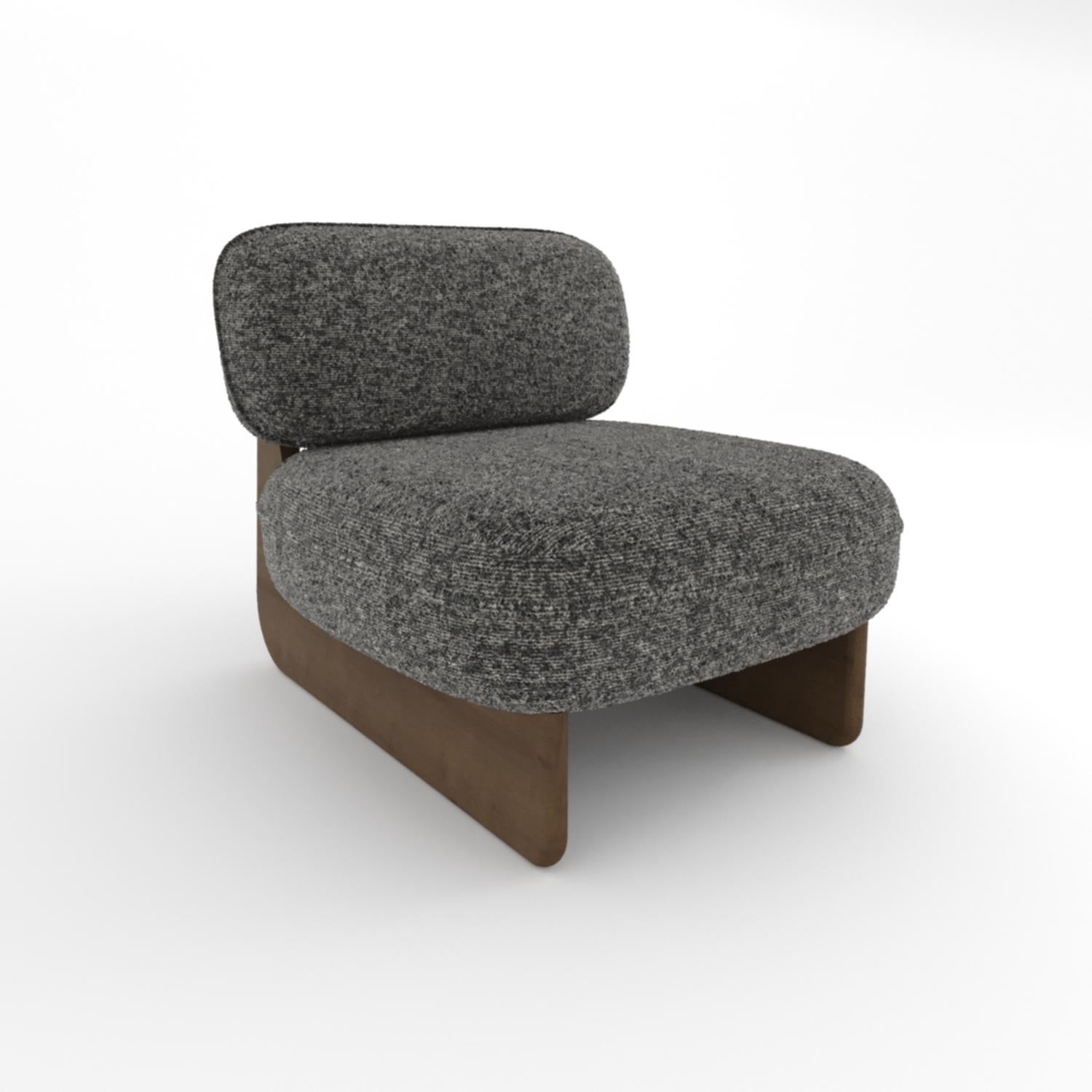 Mélange harmonieux d'artisanat et de détente, la chaise longue Riva présente une base sculpturale en bois associée à des coussins rembourrés et moelleux. Sa forme fluide et organique offre à la fois un attrait visuel et un confort exceptionnel, ce