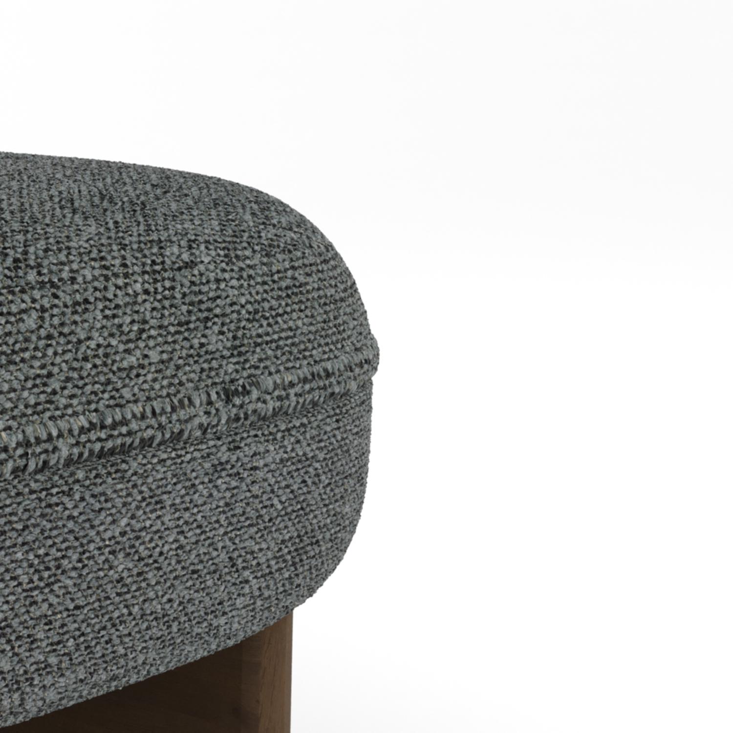A harmonious blend of craftsmanship and relaxation, the Riva Lounge Chair features a sculptural wooden base paired with plush, upholstered cushions. Its fluid, organic form offers both visual appeal and exceptional comfort, making it a perfect