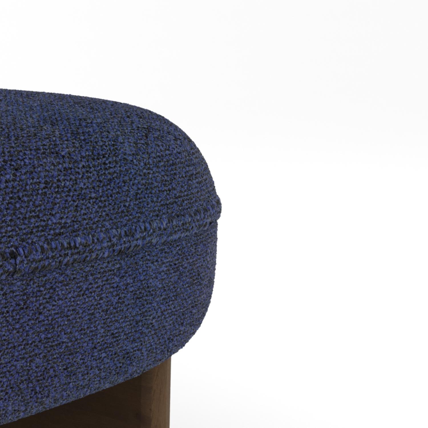 A harmonious blend of craftsmanship and relaxation, the Riva Lounge Chair features a sculptural wooden base paired with plush, upholstered cushions. Its fluid, organic form offers both visual appeal and exceptional comfort, making it a perfect