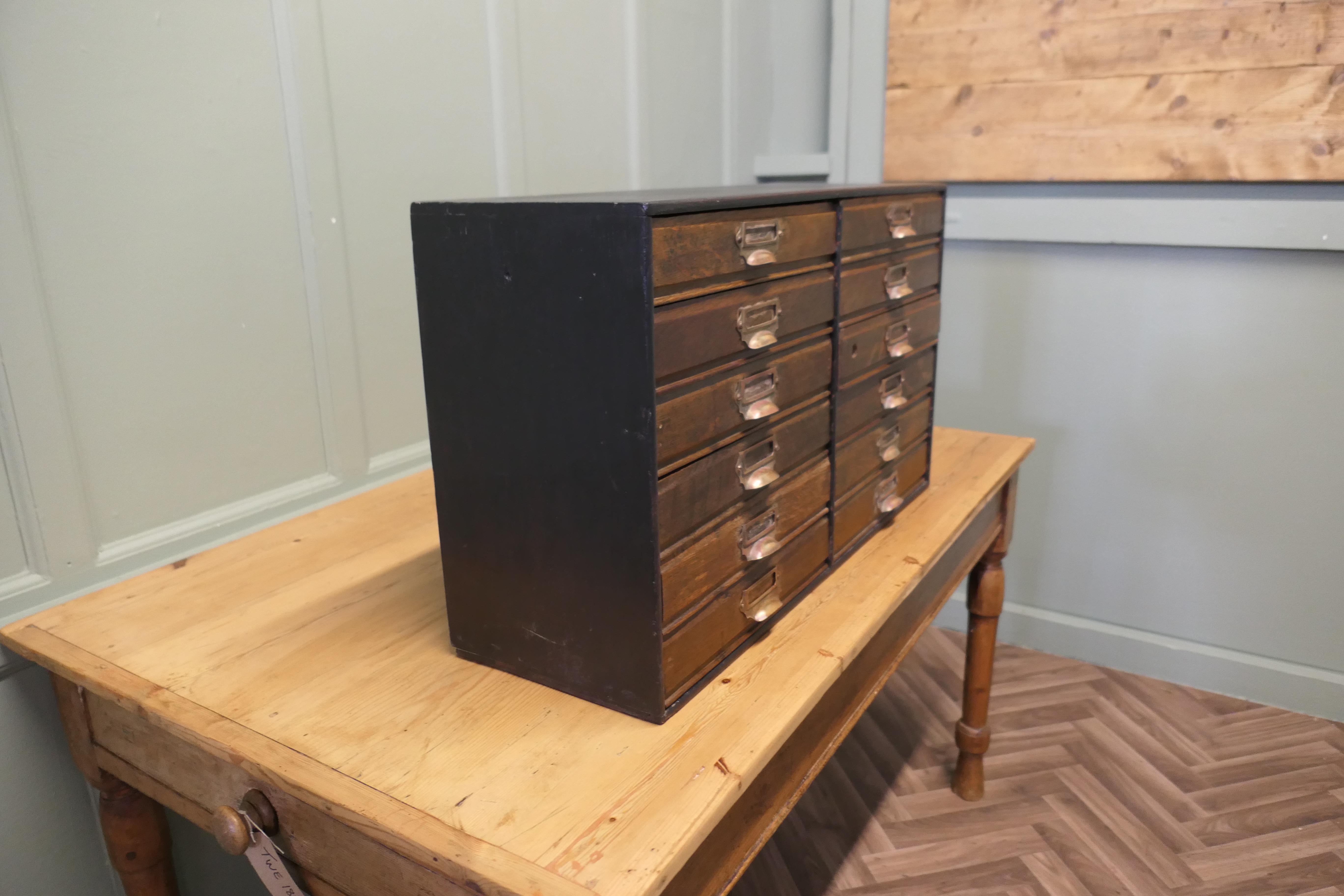 Early 20th Century Collectors Cabinet Filing Drawers  The Cabinet has 12 Drawers For Sale