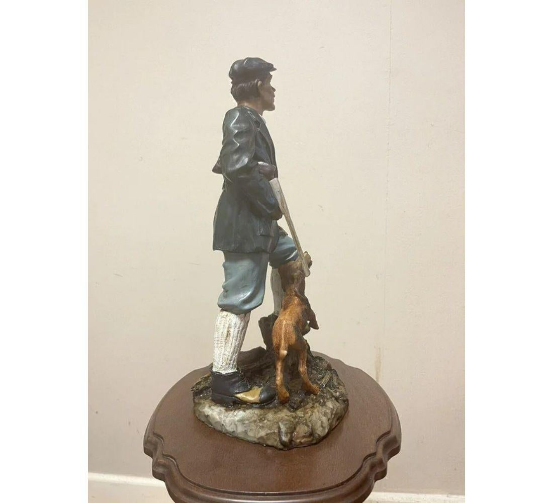 Hand-Crafted Collectors Country Man with Dog Figurine For Sale
