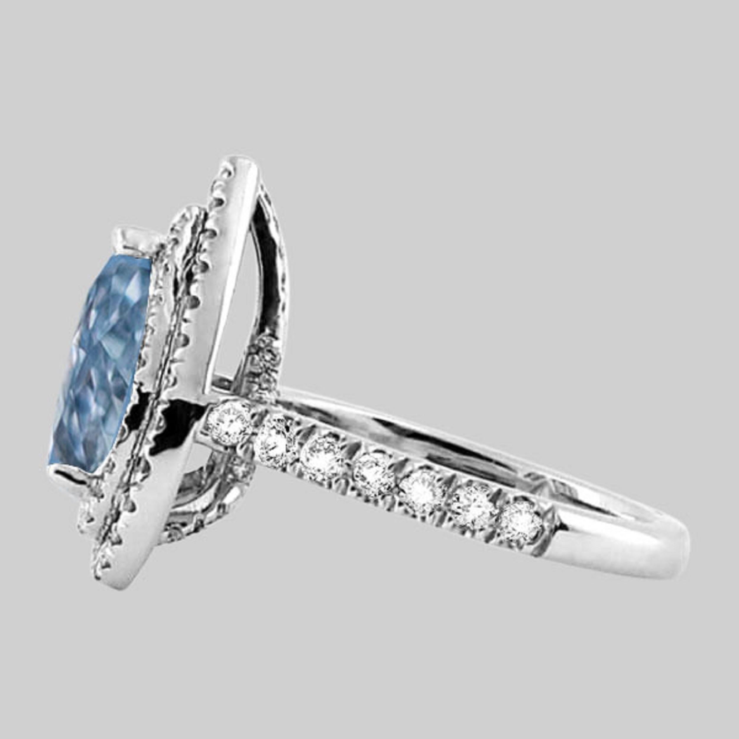 blue pear shaped engagement ring