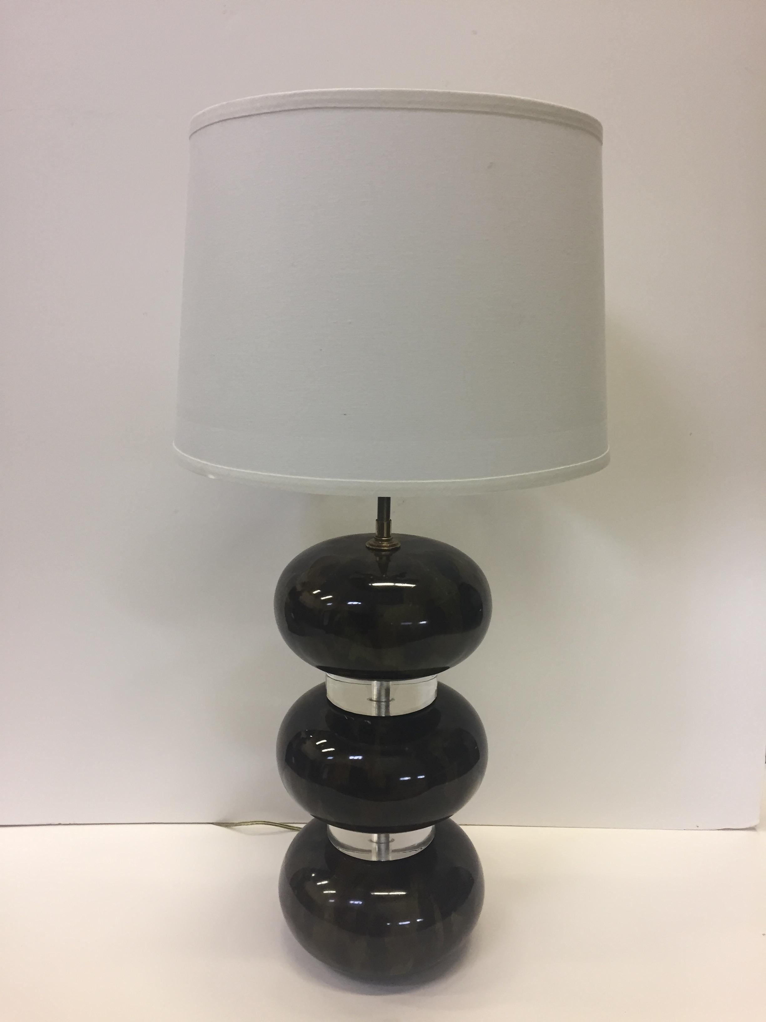 Karl Springer Mid-Century Modern eye-catching lamp having stacked lacquered wooden discs that look like tortoiseshell, with cool Lucite cylinders in between. Chrome hardware. The height measures to the hardware not to the shade as shade is not