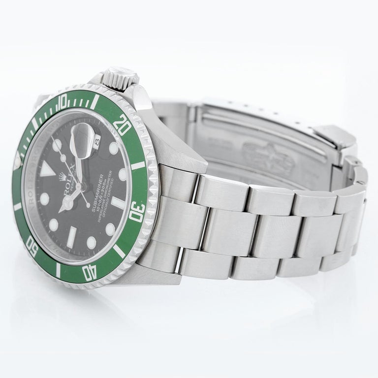 Collectors Rolex Submariner 16610 Stainless Steel Kermit  Men's Watch - Automatic winding, 31 jewels, Quickset, sapphire crystal. Stainless steel case; rotating bezel with green insert. Black dial with luminous hour markers. Stainless steel Oyster