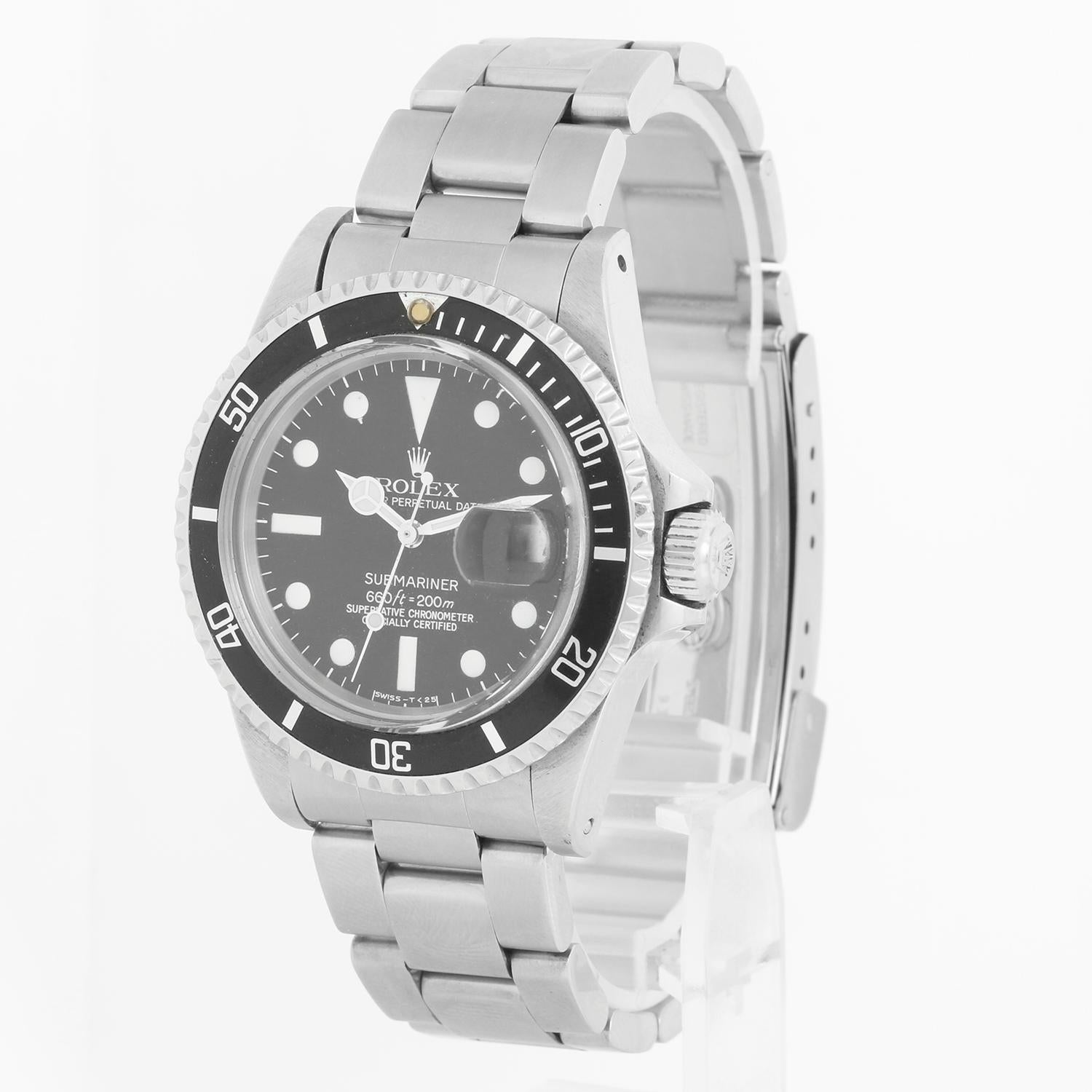 Rolex Submariner 1680 Automatic Mens Watch - Automatic. Stainless steel case with rotating bezel (40mm diameter). Black dial with luminous markers. Stainless steel Oyster bracelet with deployant clasp. Pre-owned with Rolex Travel Box. Circa 1973.