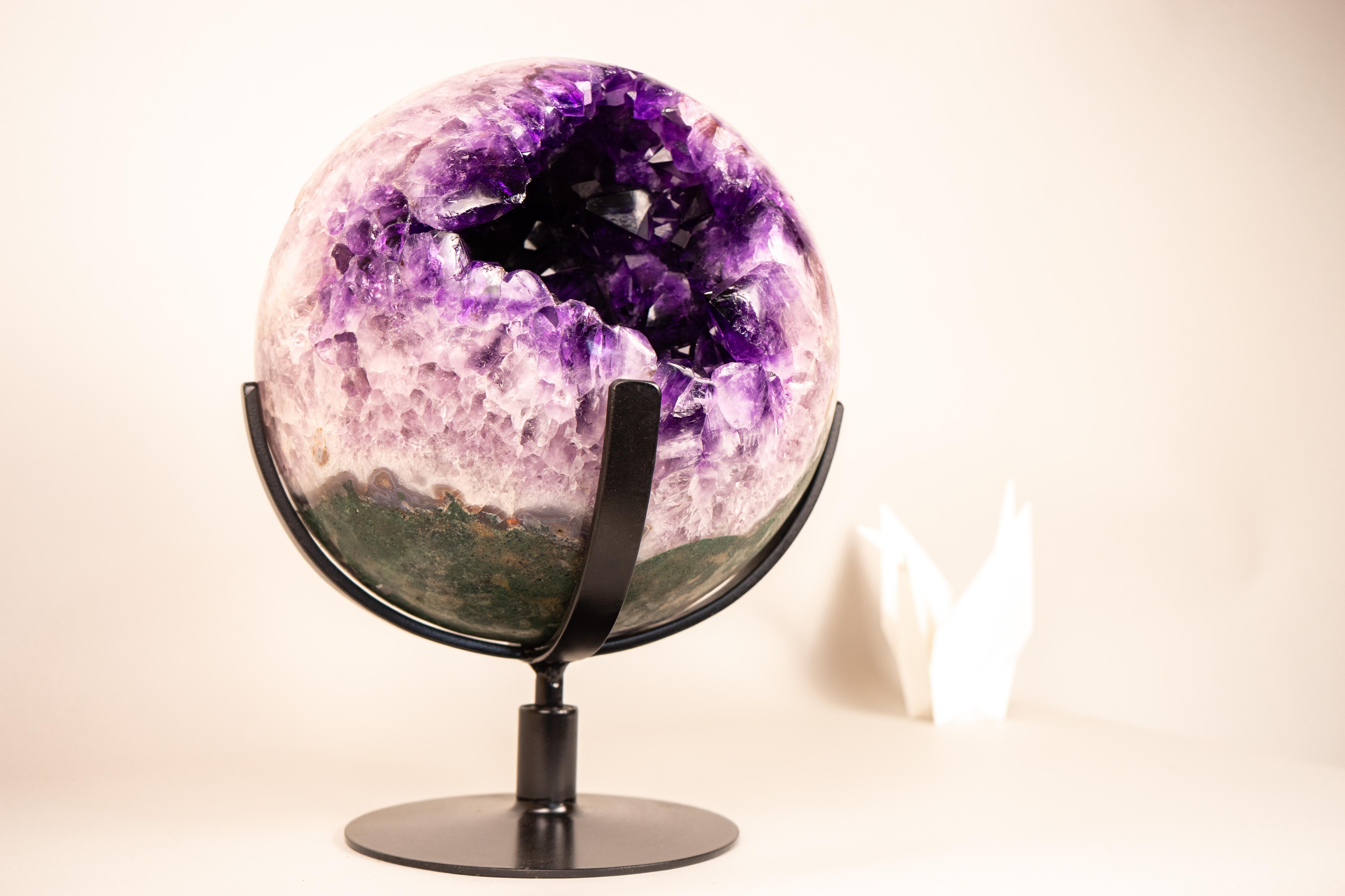 Rare XL Amethyst Sphere with Grape Jelly Purple Crystals – Stunning Natural Statement Piece

▫️ Description

This extraordinary, rare X-Large Amethyst Sphere beautifully showcases the highest quality, deep-purple amethyst crystals of impressive