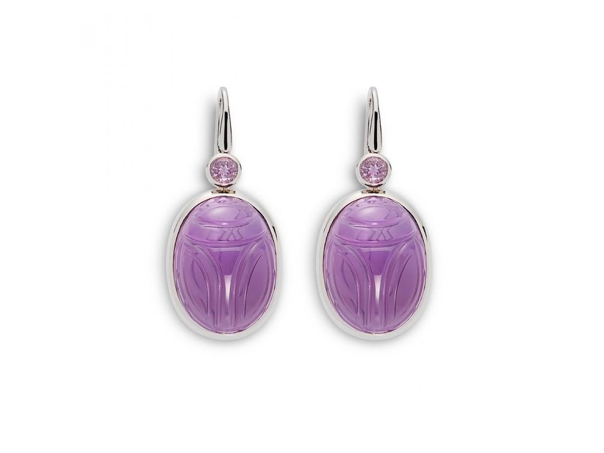 Two amethyst scarabs 43,73 ct and two small amethysts 0.43 ct adorn the 18k white gold setting. 
Designed by Colleen B. Rosenblat.