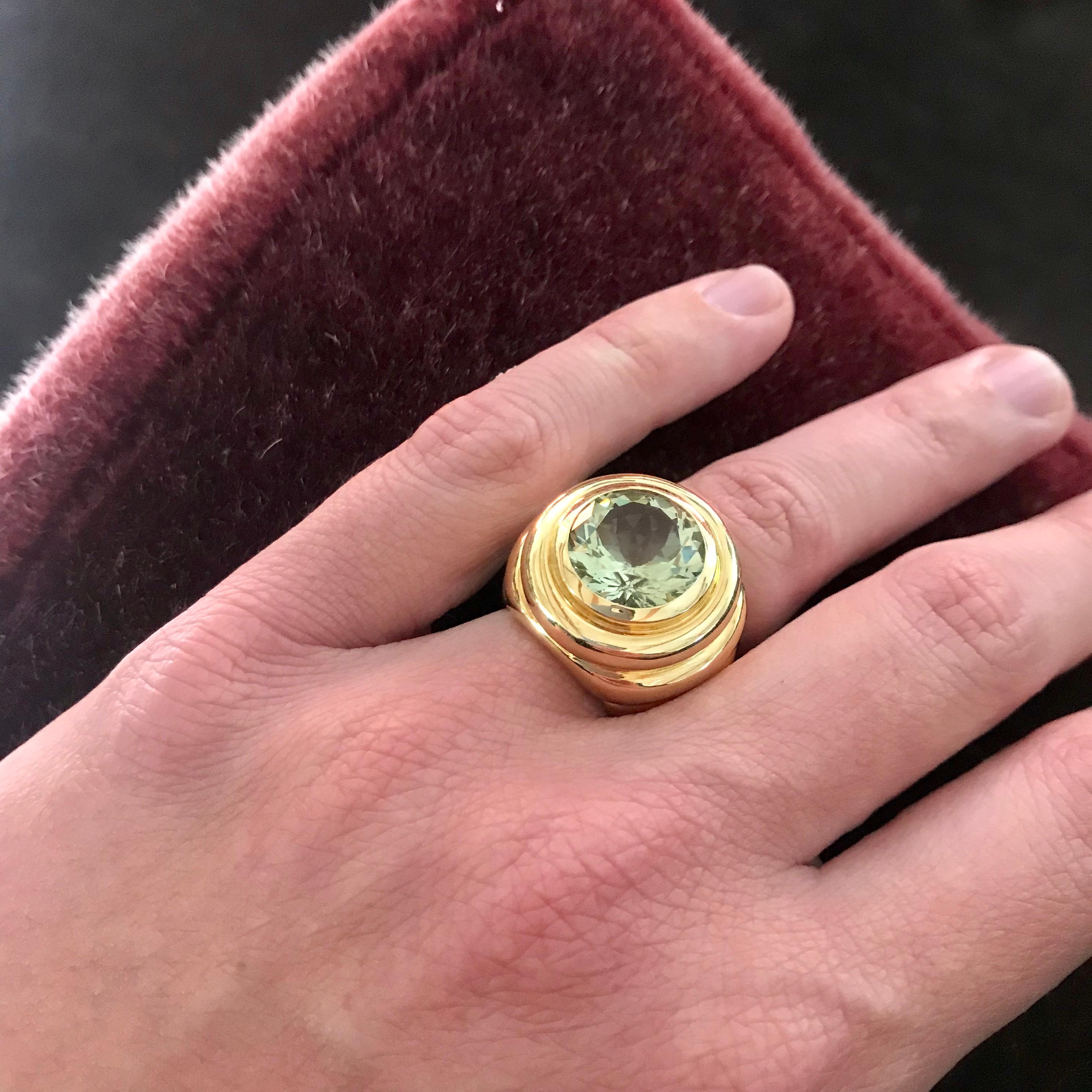 One of a kind 18 carat yellow gold ring has a stunning 8,83 ct. beryl centerpice.
The handmade ring features cascading design.