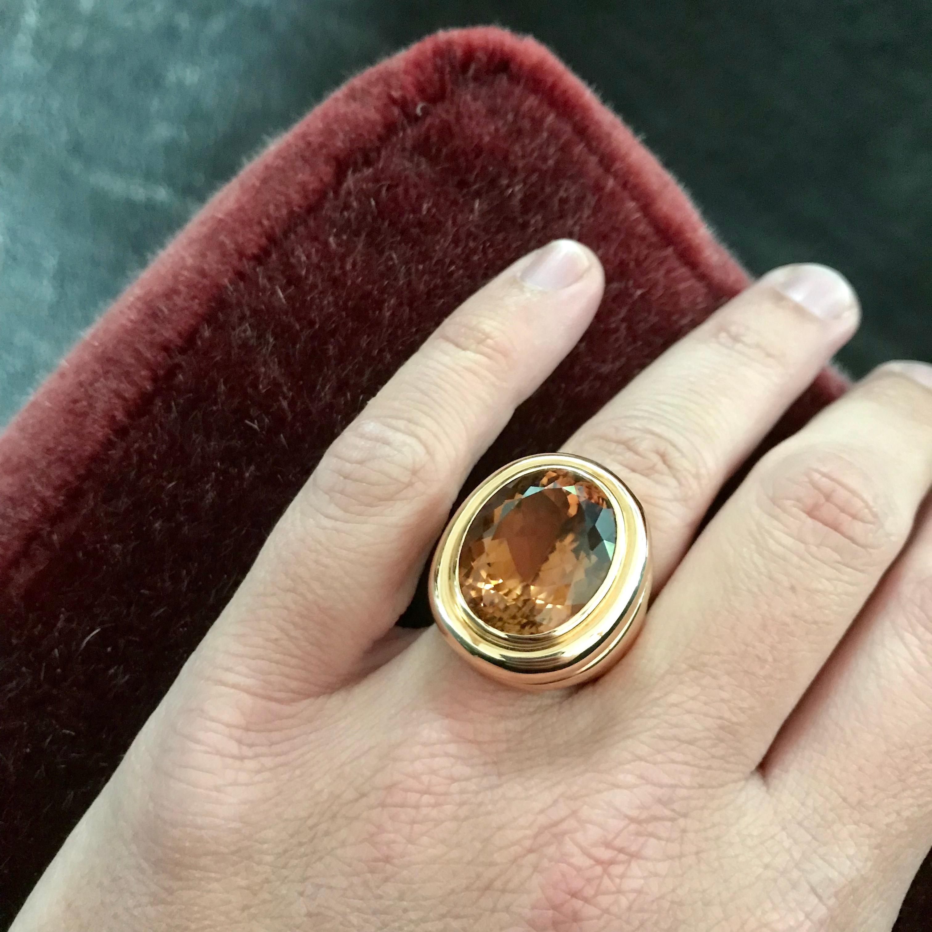 This ring, set in 18 carat rose gold, captivates with a brown tourmaline 24,28 ct. It is designed by Colleen B. Rosenblat.