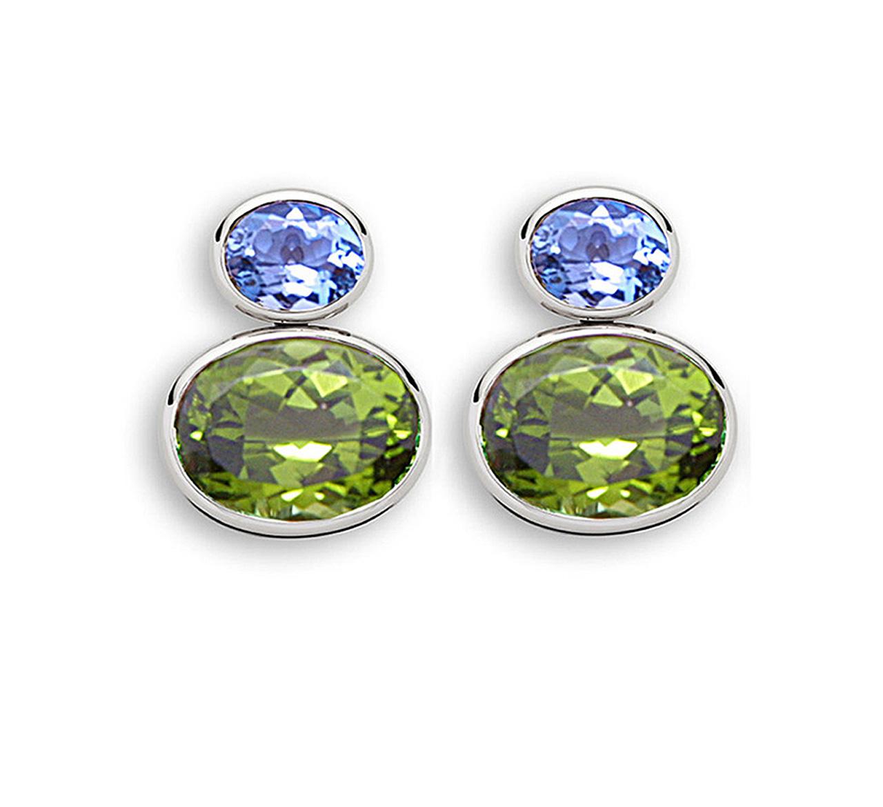 These 18k white gold earrings with two enticing peridots 17.55 ct and two shimmering aquamarine 3.55 ct are from the beautiful pure design by Colleen B. Rosenblat.