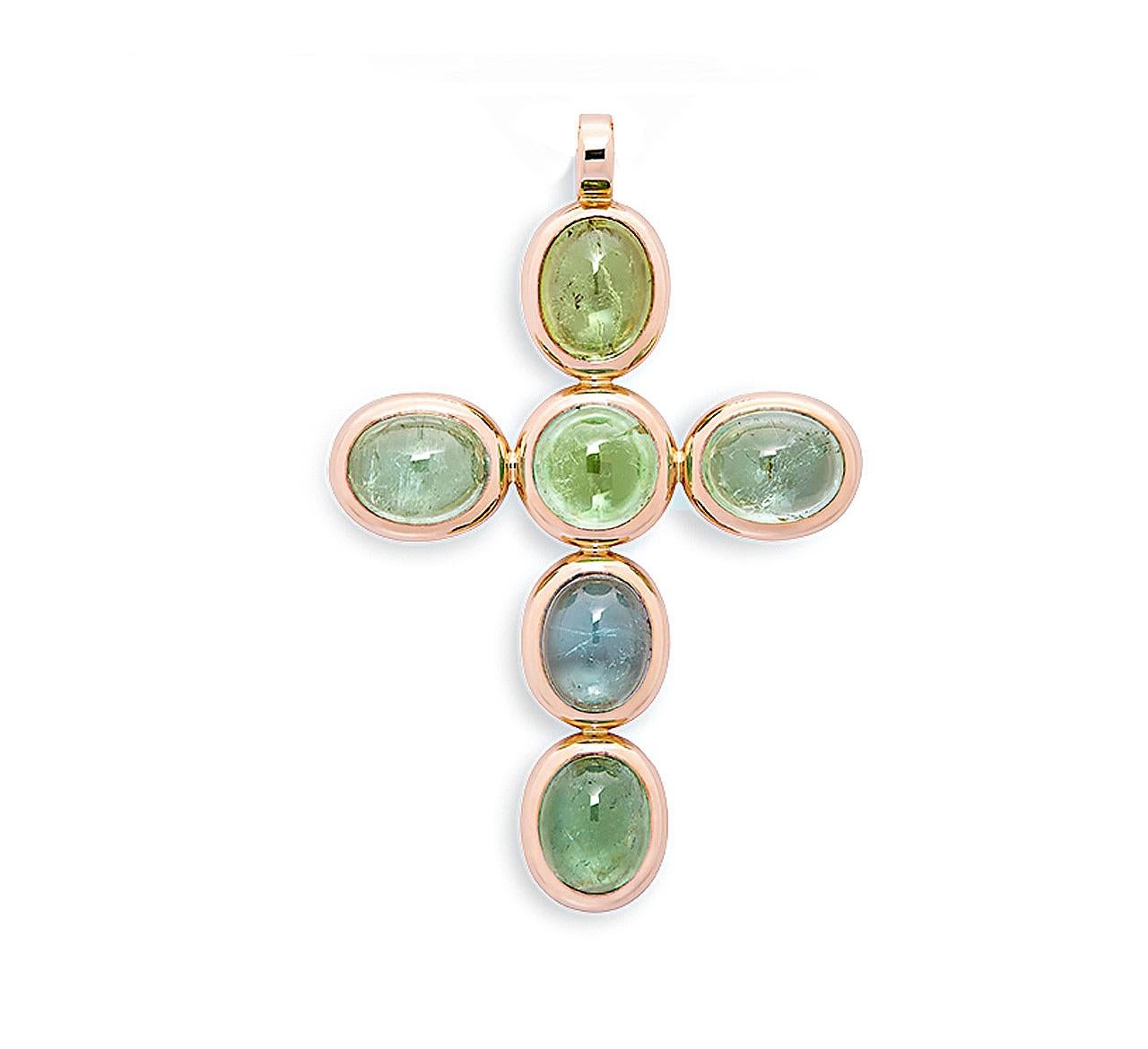 Six tourmaline cabochons 18.39 ct adorn this beautiful 18k rose gold cross-pendant which is designed by Colleen B. Rosenblat.