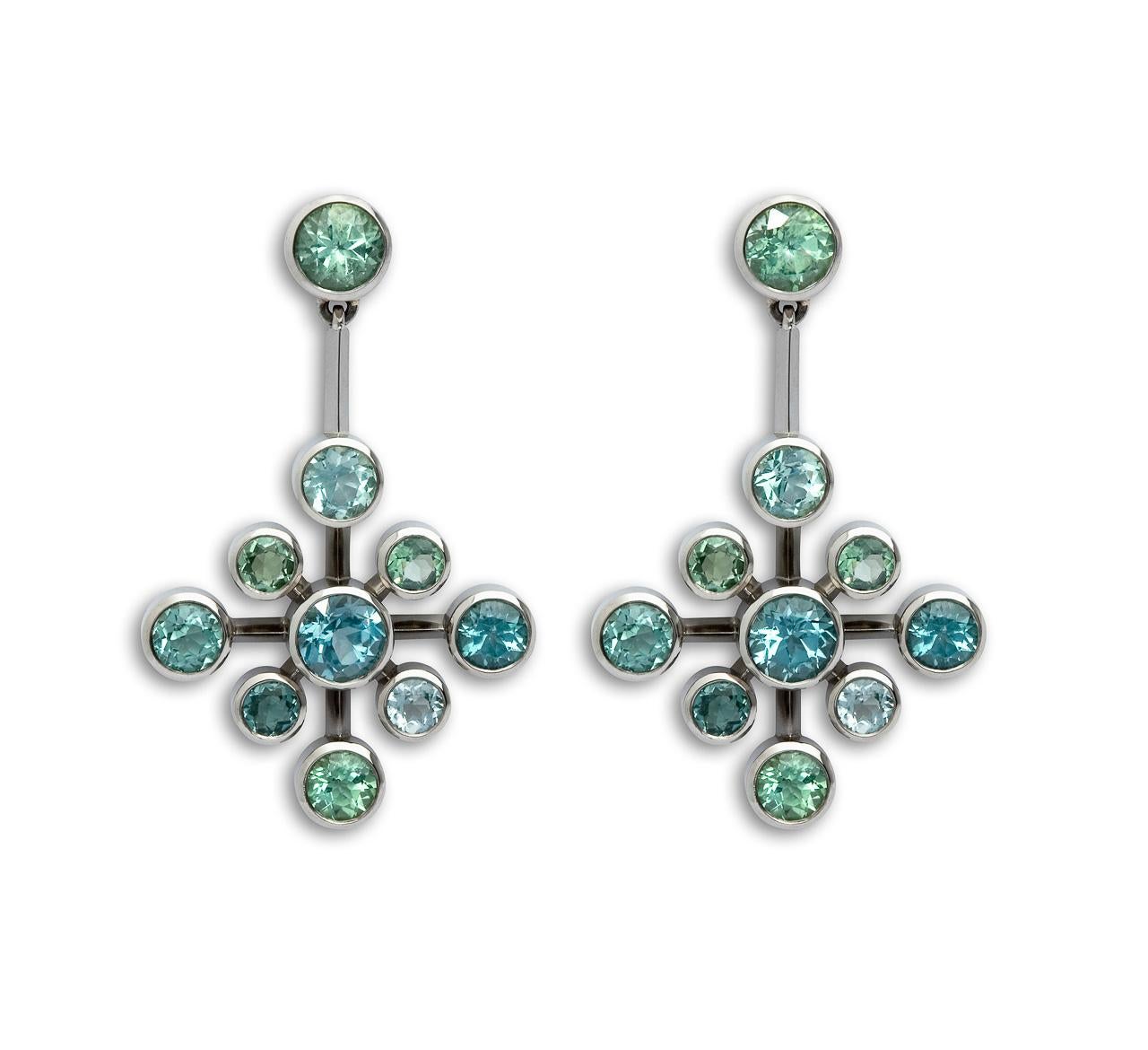 One of a kind ice crystal earrings feature 20 blue and green tourmaline and are set 18K white gold.