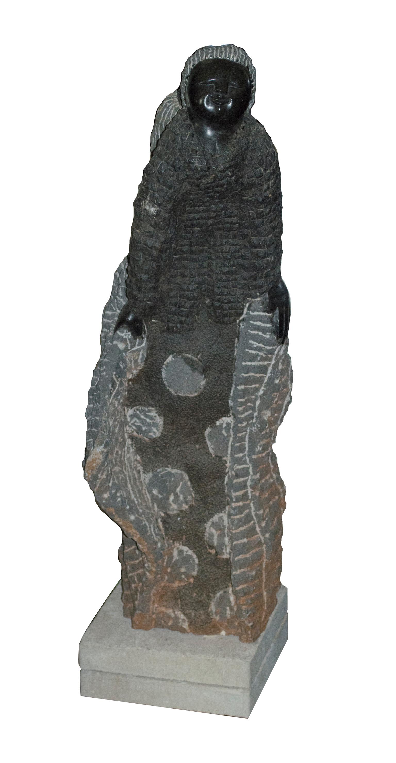 "Celebrations (C-56)" is an original black serpentine stone sculpture by Colleen Madamombe. The artist signed the piece, and it weighs 228 pounds. This piece features a woman with a large, textured dress. 

Sculpture Size: 39" x 14" x 16"

Artist