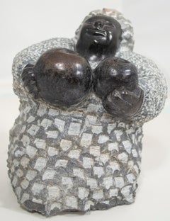 'Holding Apples' original Shona stone sculpture signed by Colleen Madamombe